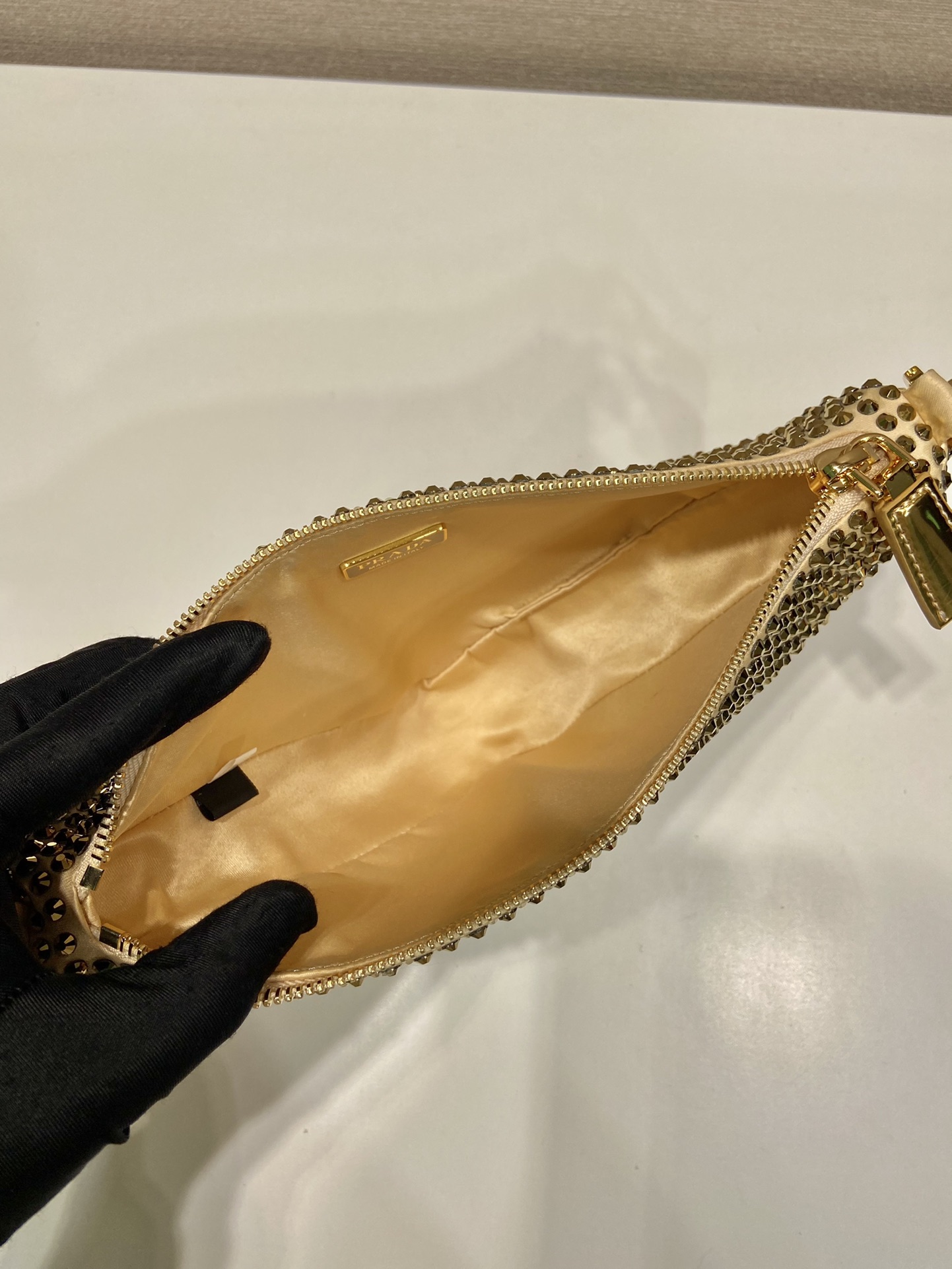 Pra*a triangle satin mini-bag with crystals