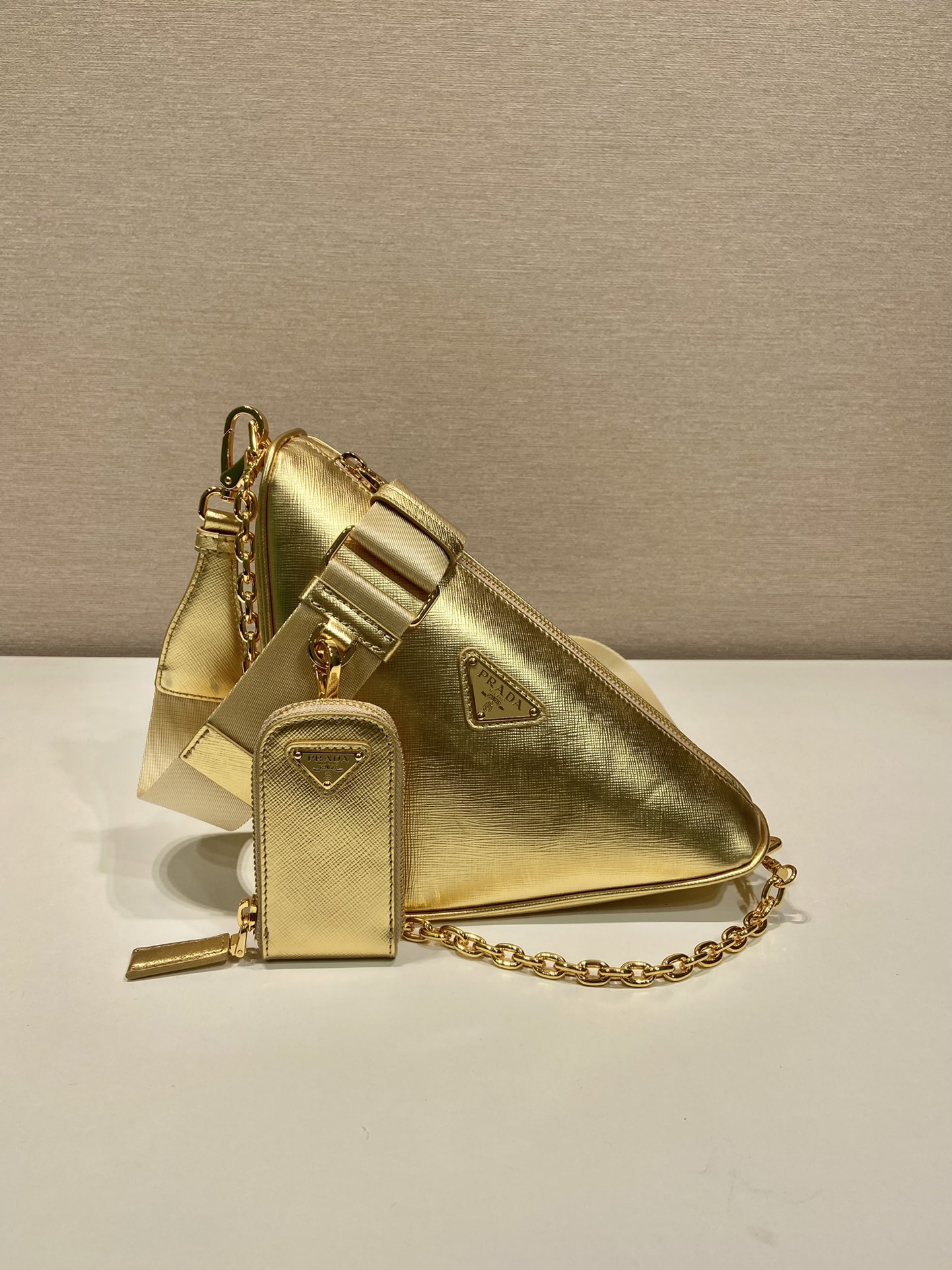 Pra*a triangle leather shoulder bag