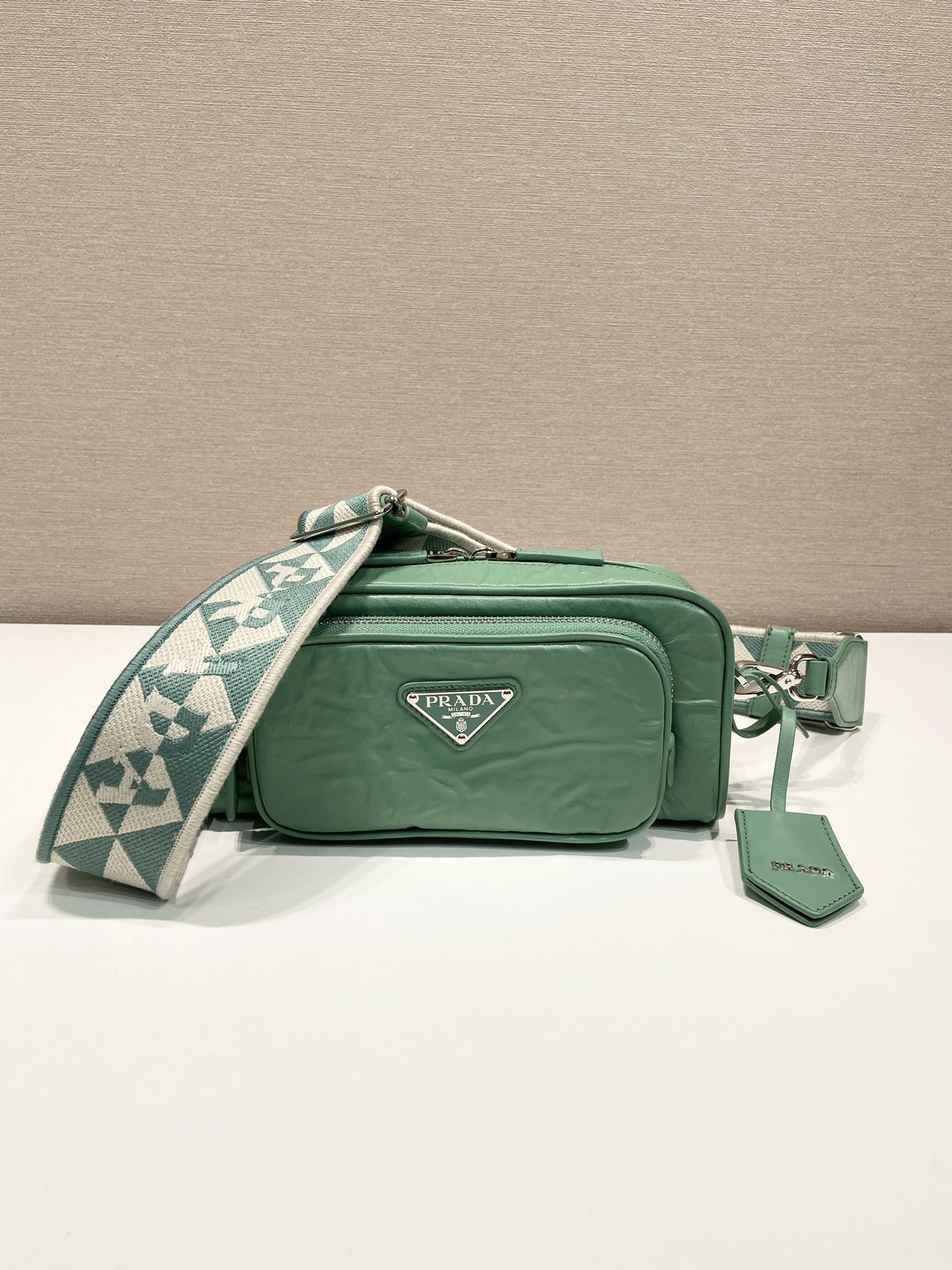 Pra*a nappa antique leather multi-pocket shoulder bag