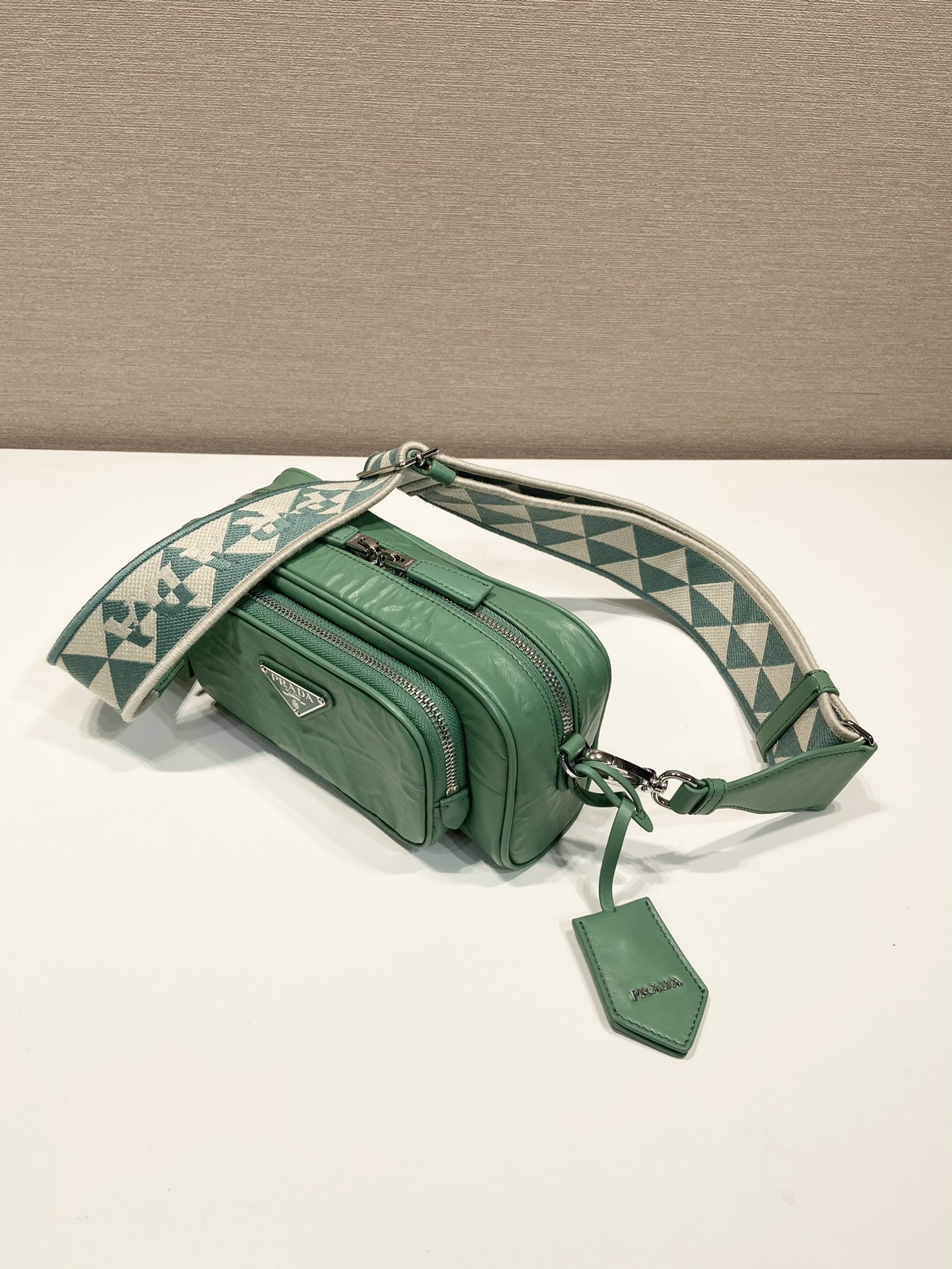 Pra*a nappa antique leather multi-pocket shoulder bag