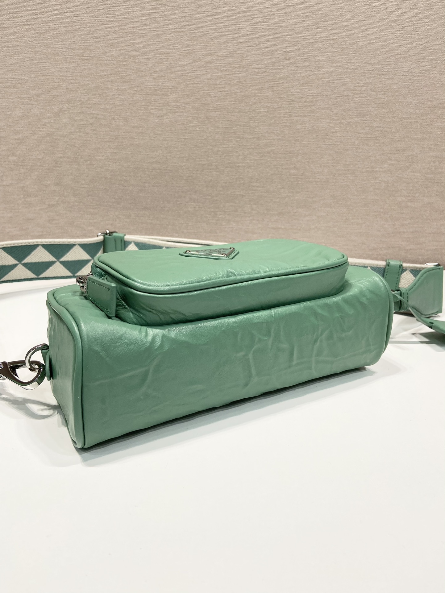 Pra*a nappa antique leather multi-pocket shoulder bag