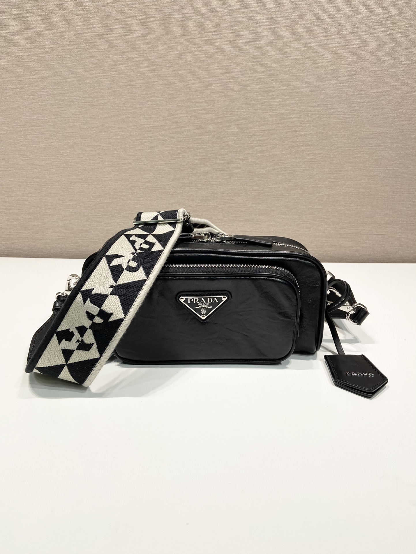 Pra*a nappa antique leather multi-pocket shoulder bag