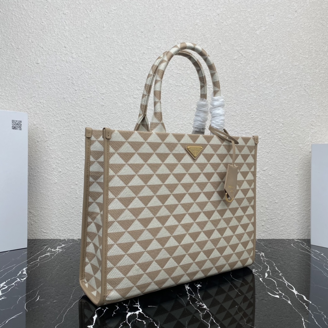 large Pra*a symbole embroidered fabric handbag