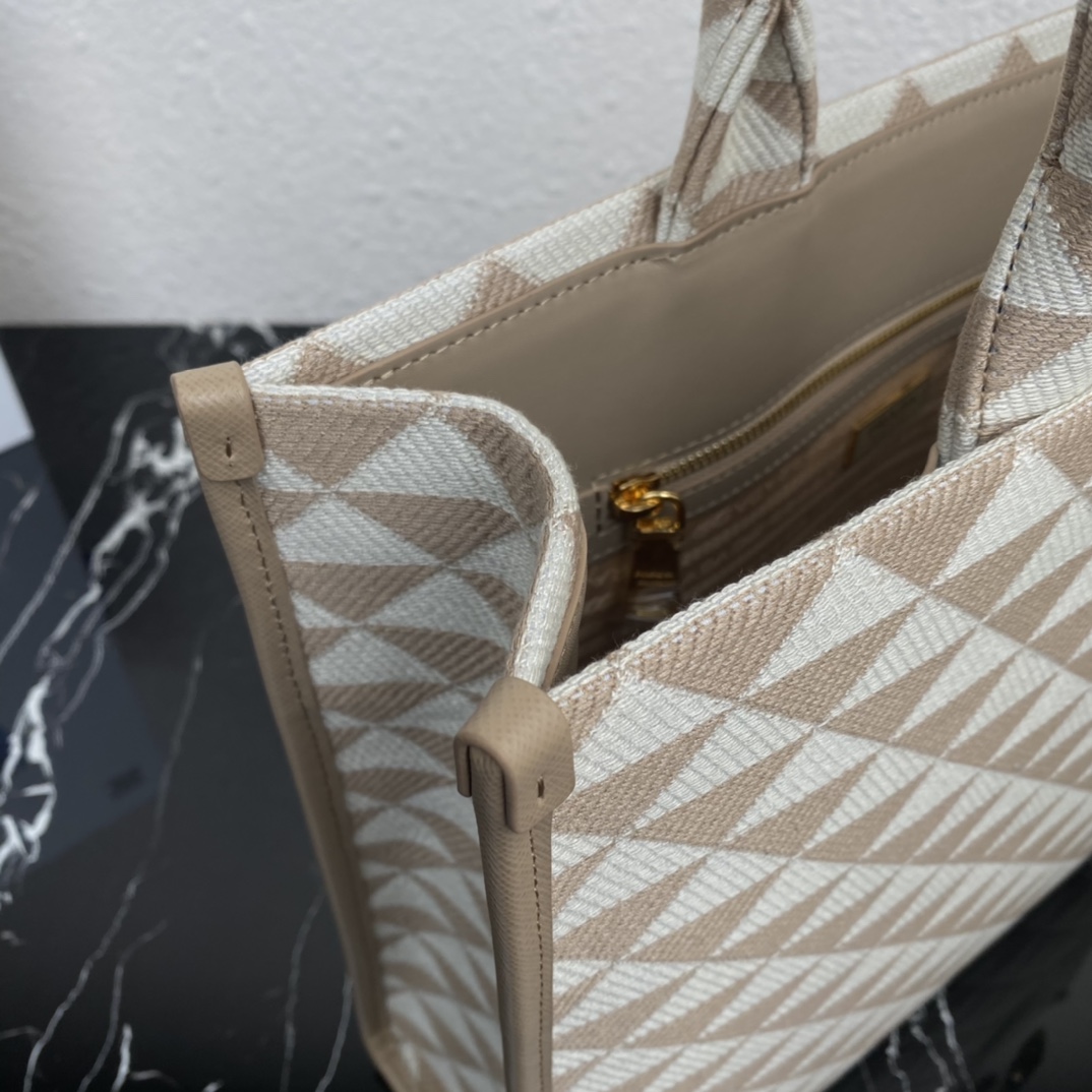 large Pra*a symbole embroidered fabric handbag