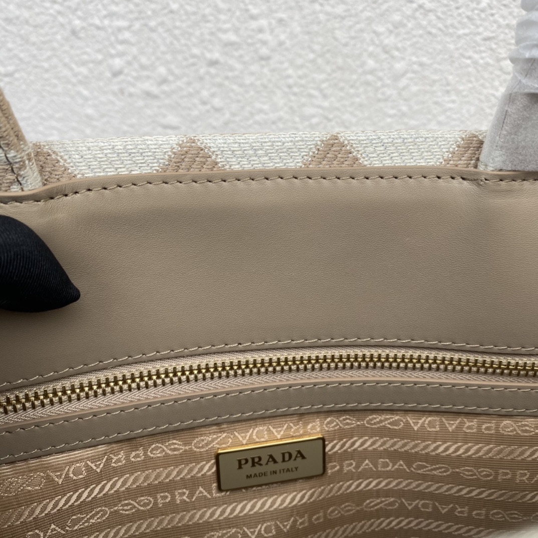 large Pra*a symbole embroidered fabric handbag