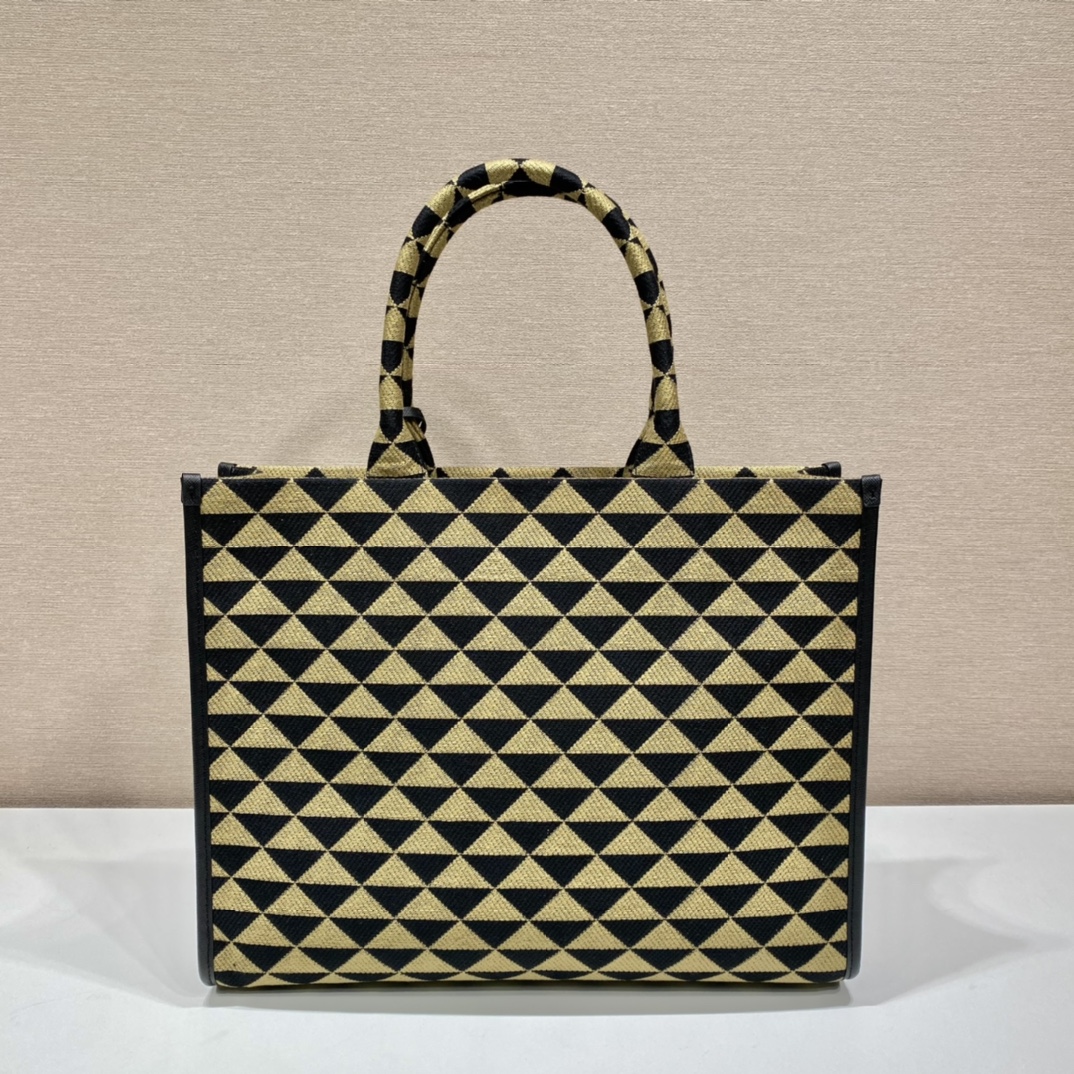 large Pra*a symbole embroidered fabric handbag