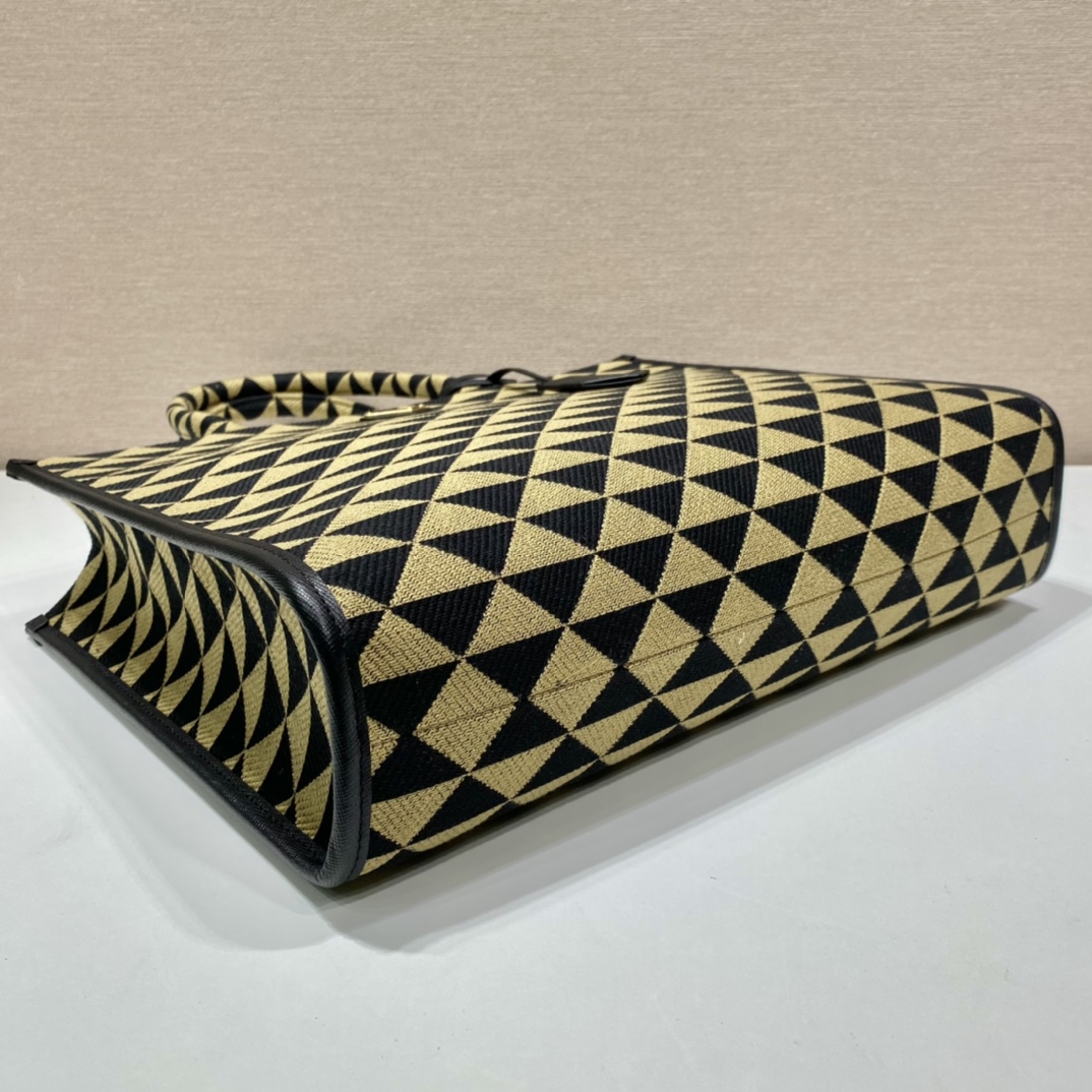 large Pra*a symbole embroidered fabric handbag