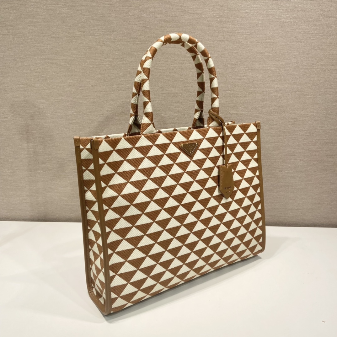 large Pra*a symbole embroidered fabric handbag