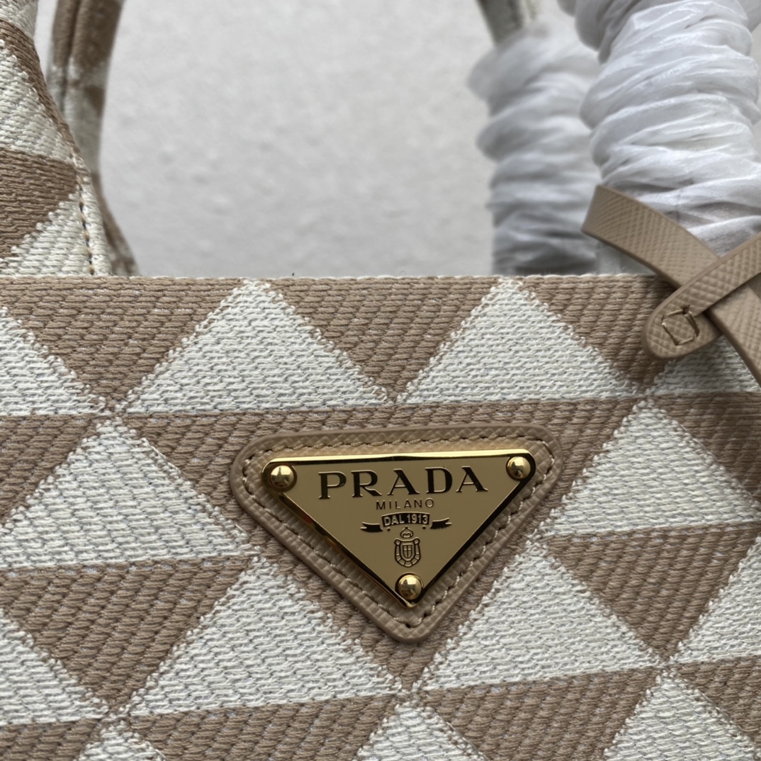 small Pra*a symbole embroidered fabric handbag