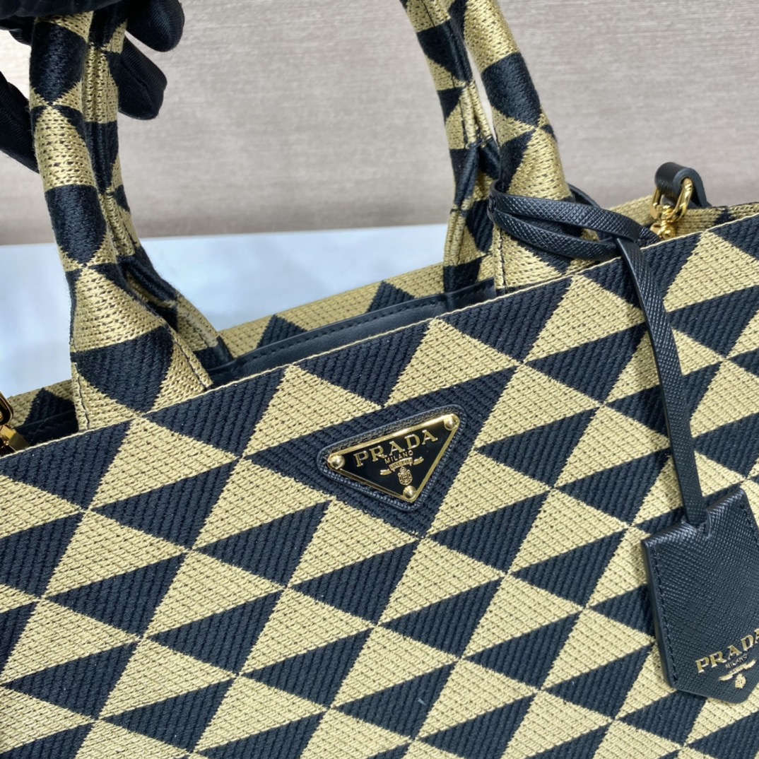 small Pra*a symbole embroidered fabric handbag