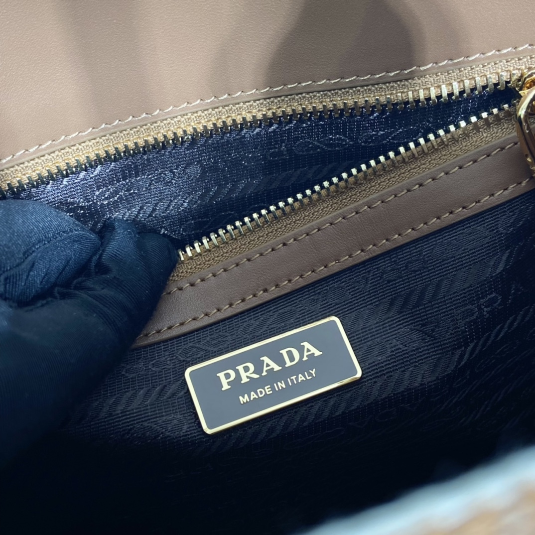 small Pra*a symbole embroidered fabric handbag