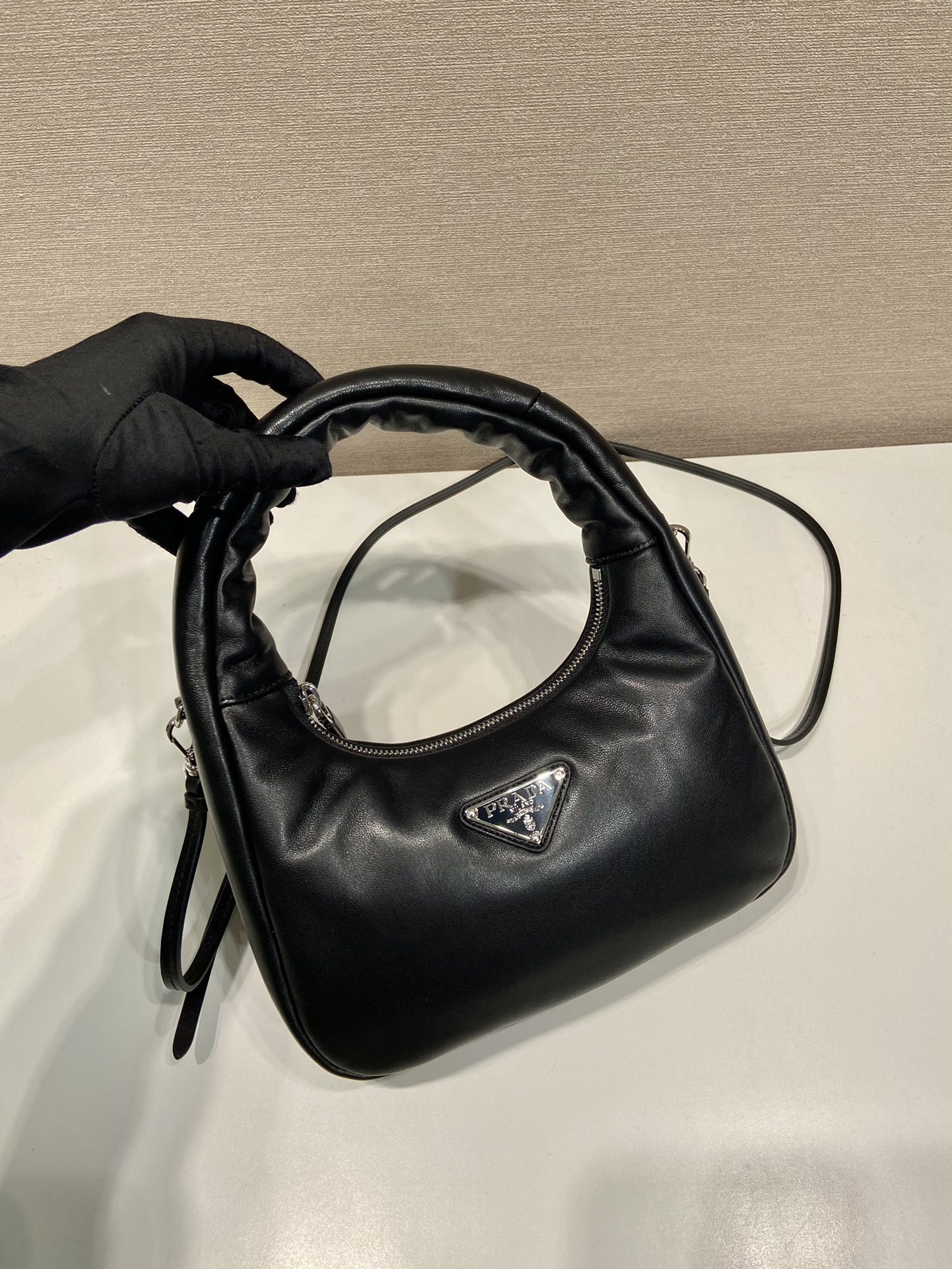 Pra*a leather mini hobo bag