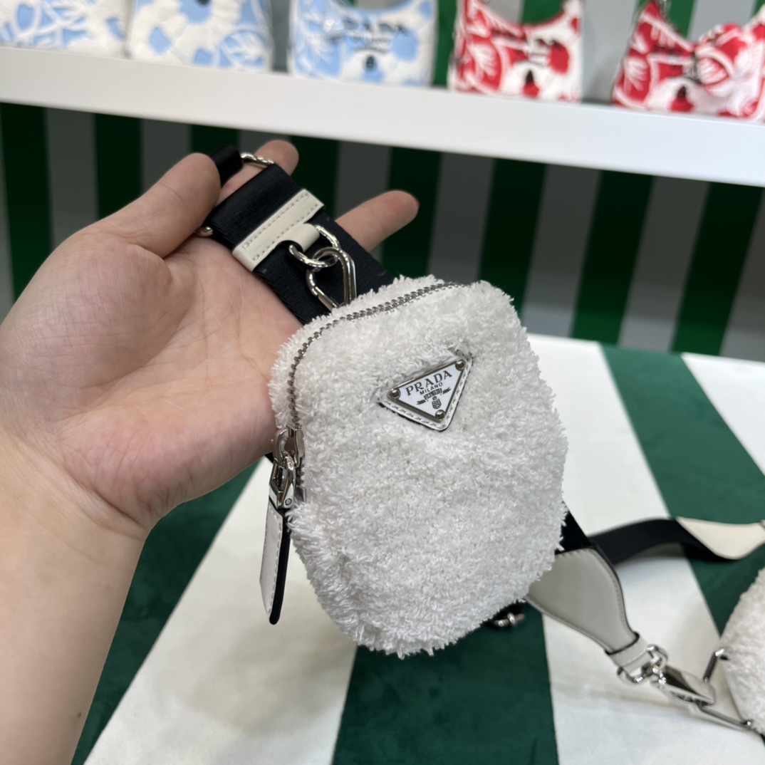 Pra*a triangle shoulder bag