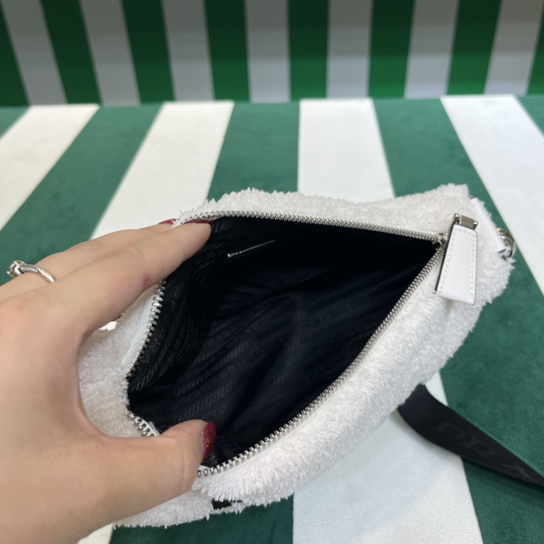 Pra*a triangle shoulder bag