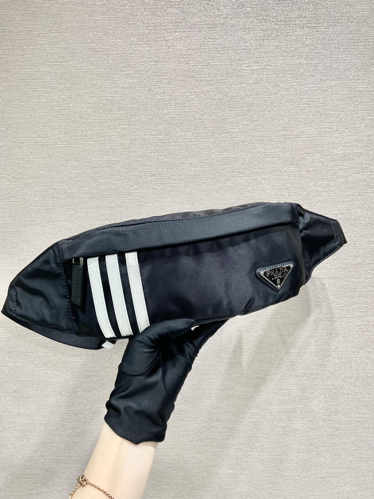 Pra*a black re-nylon and saffiano leather belt bag