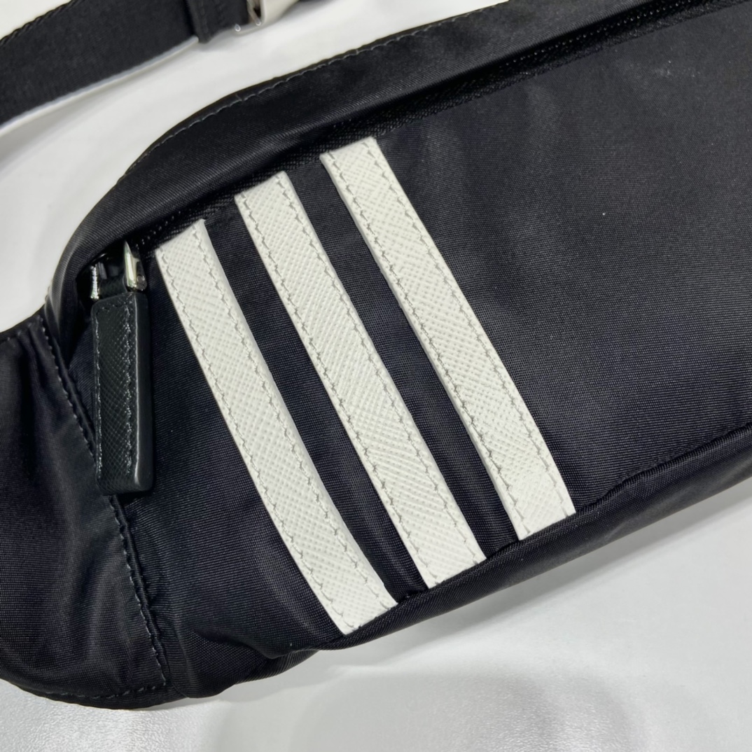 Pra*a black re-nylon and saffiano leather belt bag