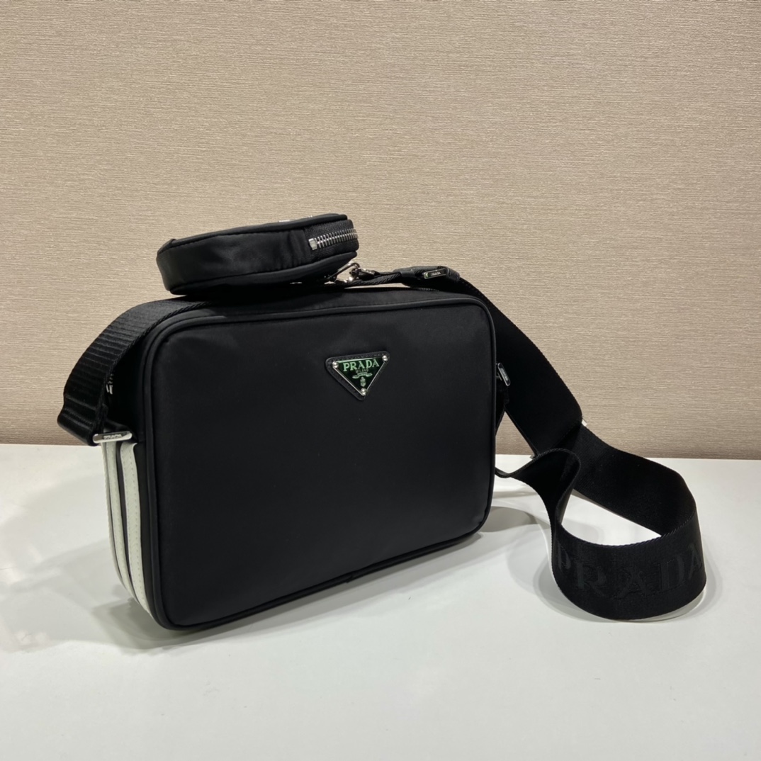 Pra*a black re-nylon and saffiano camera bag