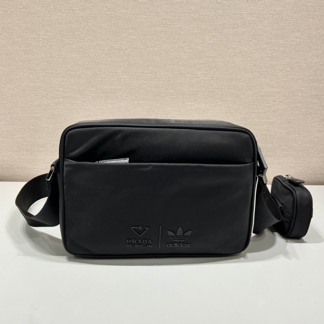 Pra*a black re-nylon and saffiano camera bag