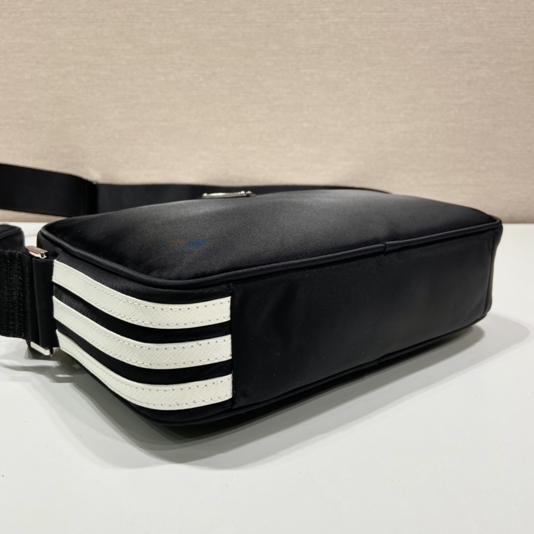 Pra*a black re-nylon and saffiano camera bag