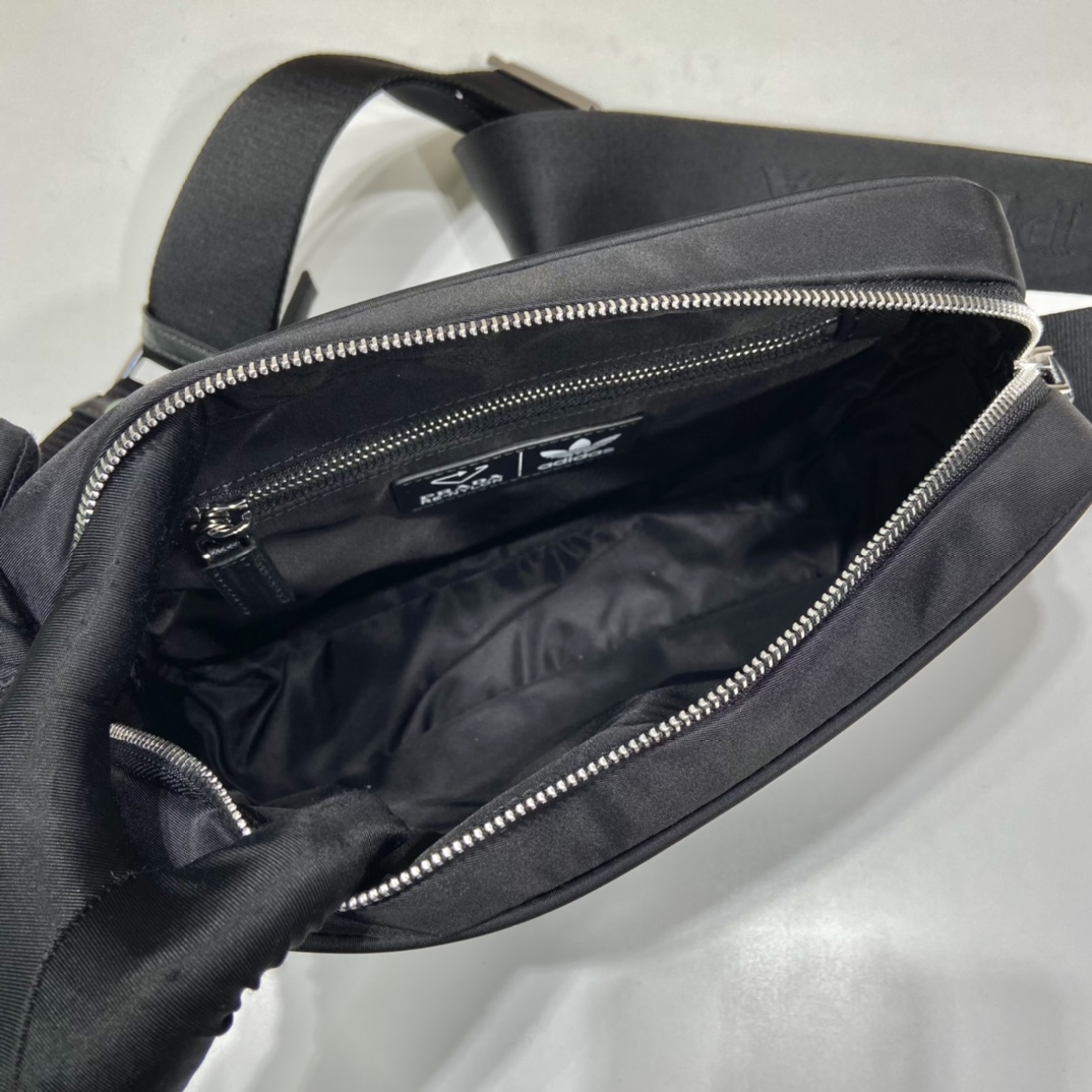 Pra*a black re-nylon and saffiano camera bag