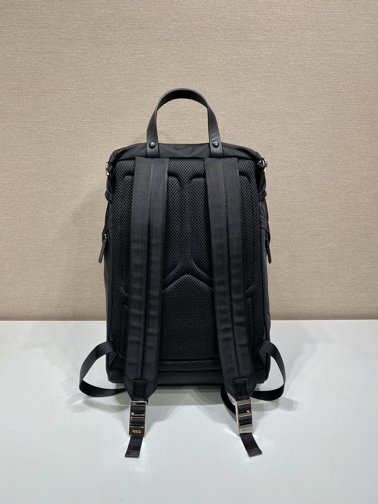 Pra*a black re-nylon and saffiano backpack