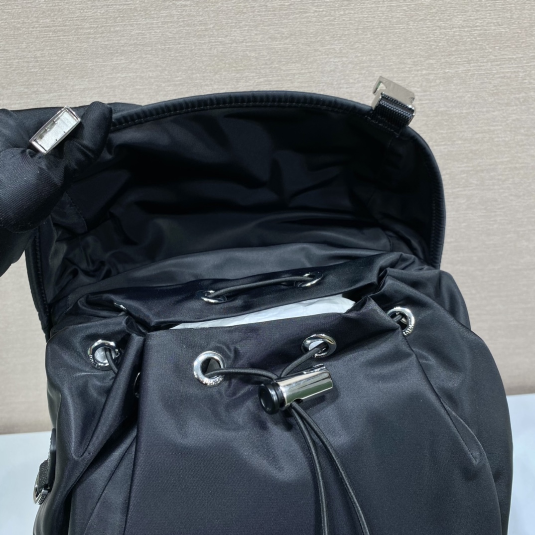 Pra*a black re-nylon and saffiano backpack