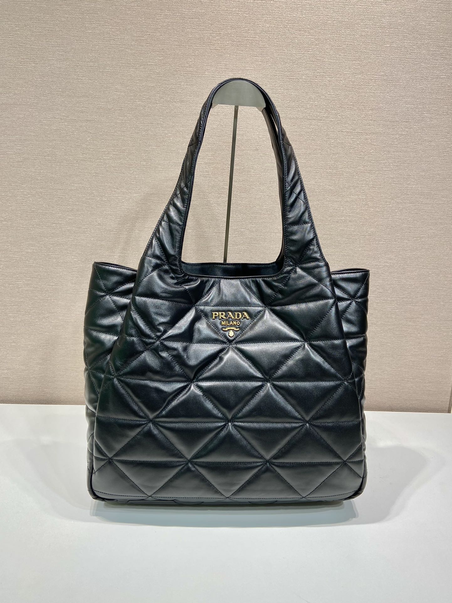 Pra*a large padded leather tote bag