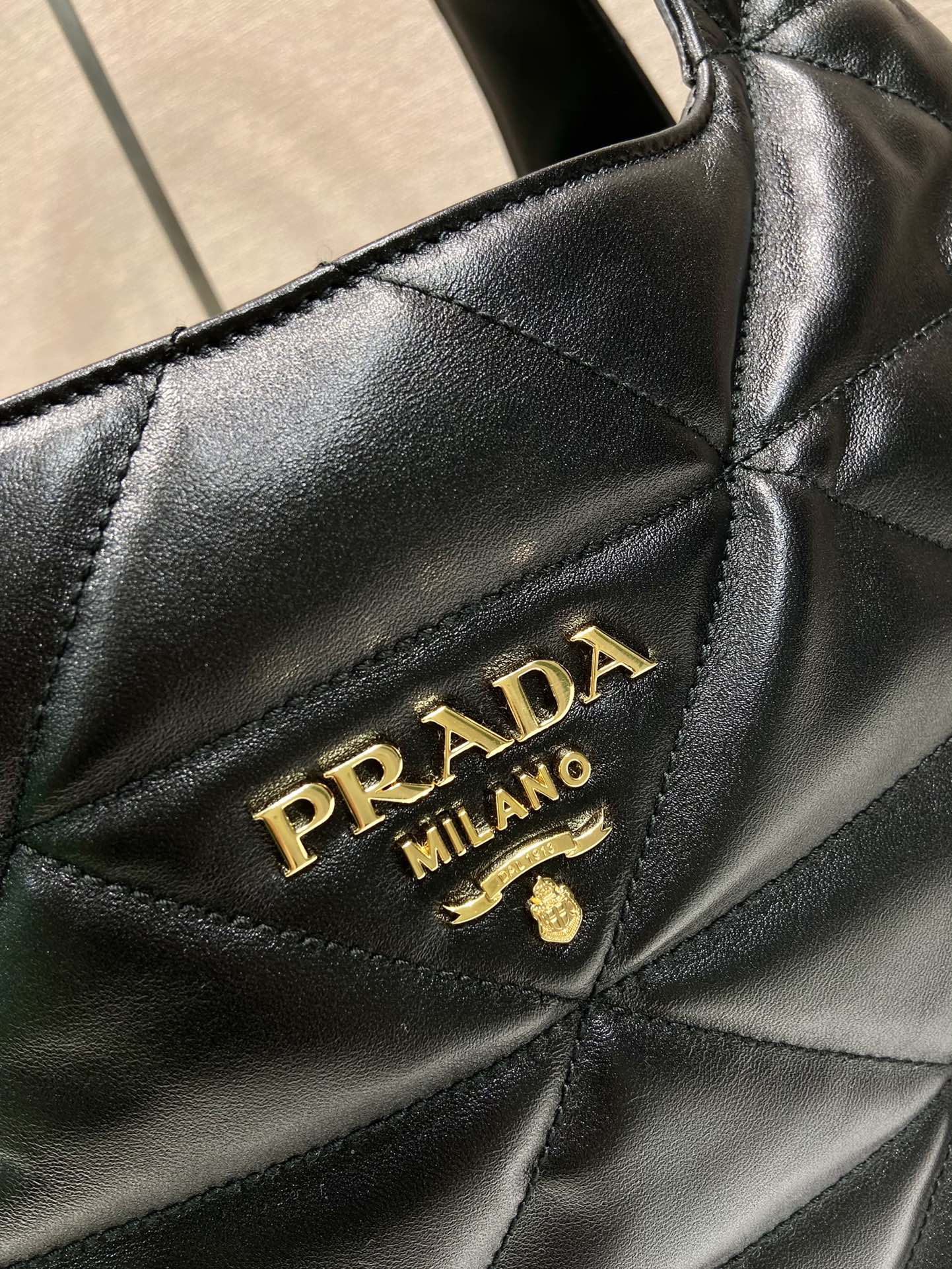 Pra*a large padded leather tote bag