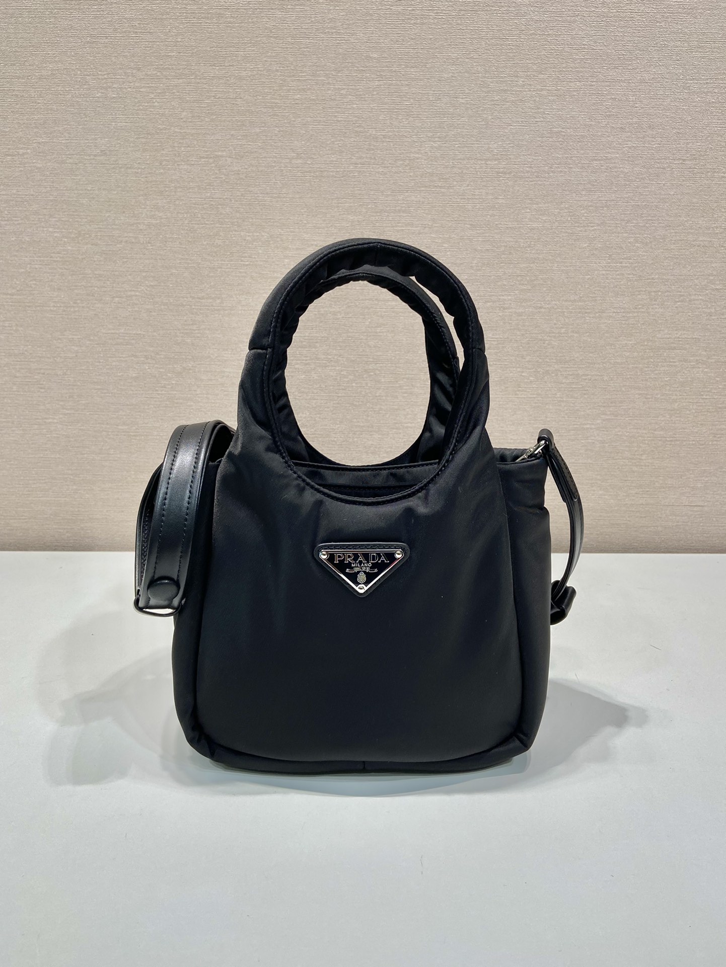 Pra*a soft padded re-nylon mini-bag