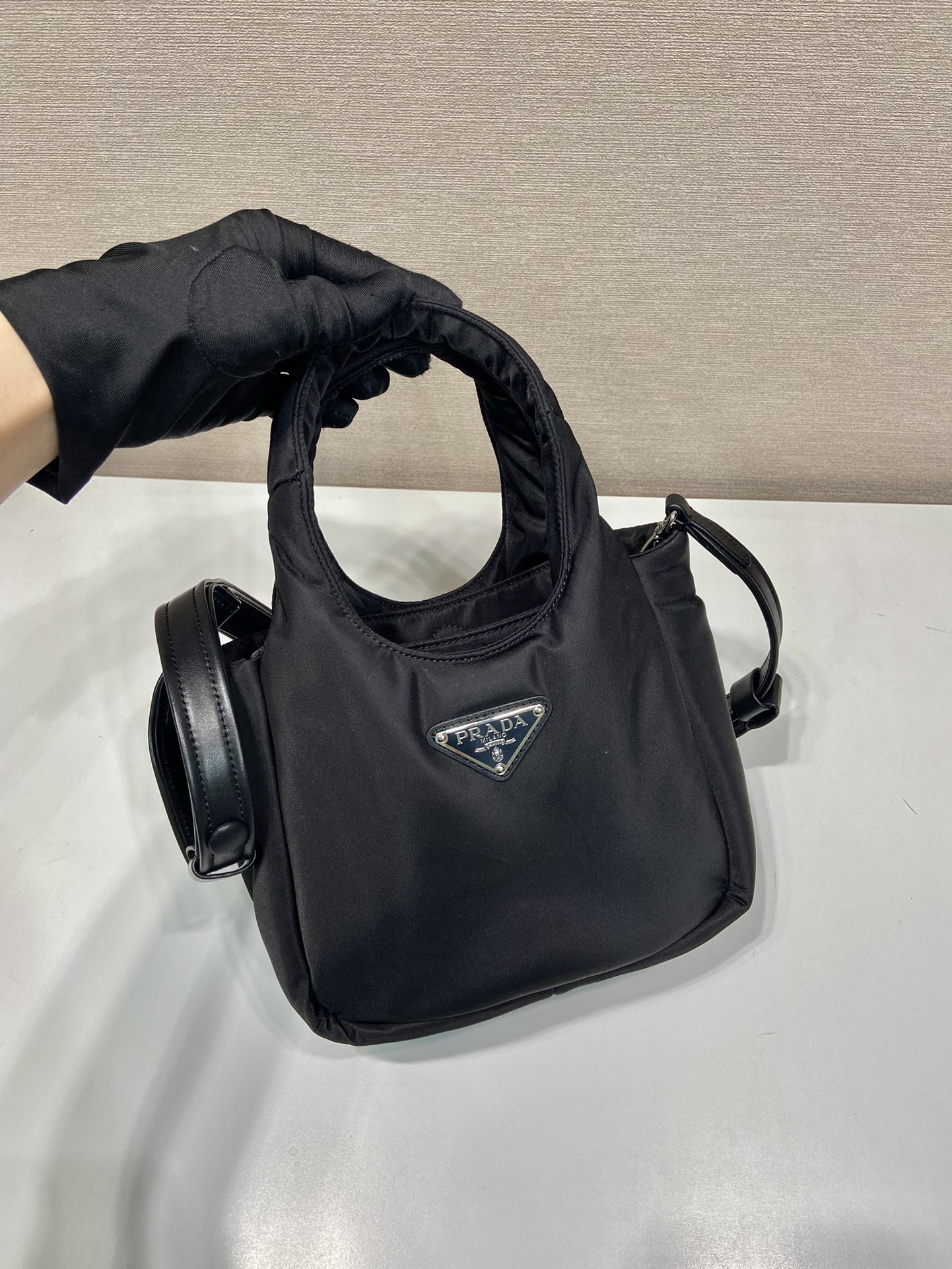 Pra*a soft padded re-nylon mini-bag