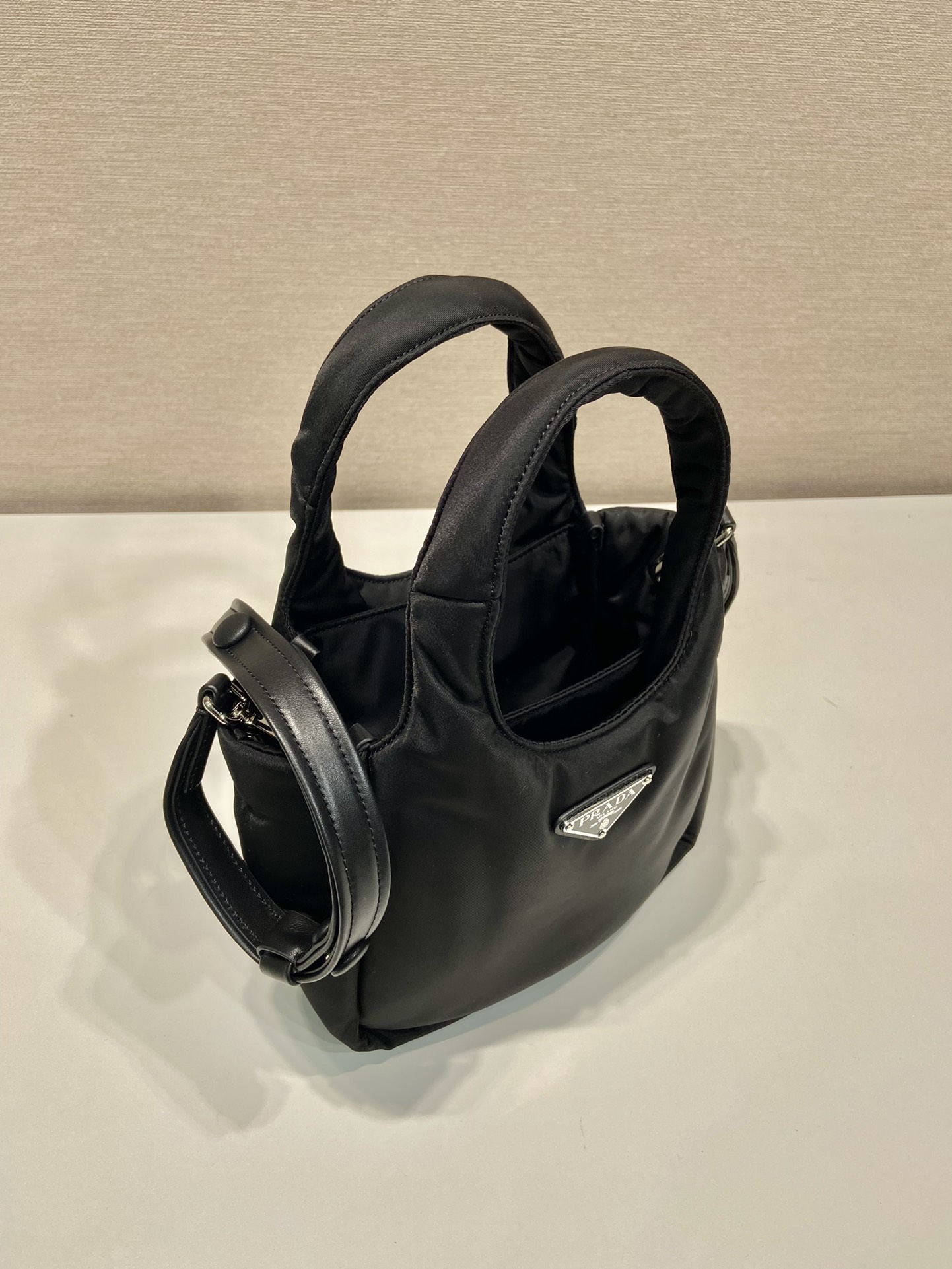 Pra*a soft padded re-nylon mini-bag