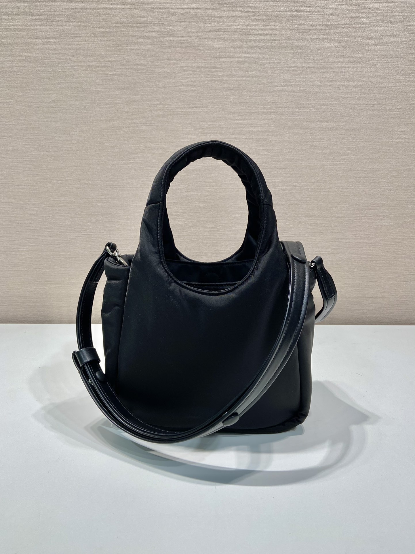 Pra*a soft padded re-nylon mini-bag