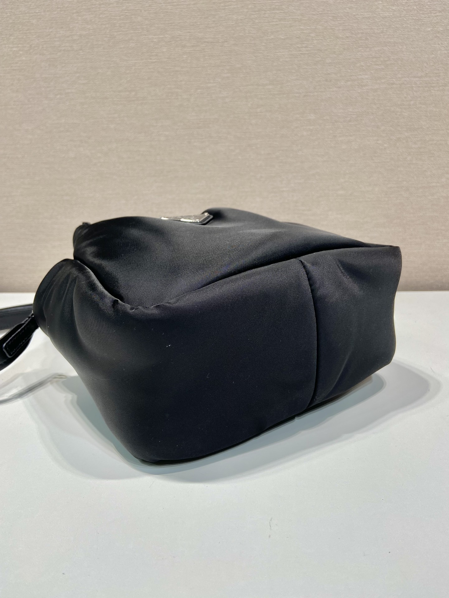 Pra*a soft padded re-nylon mini-bag