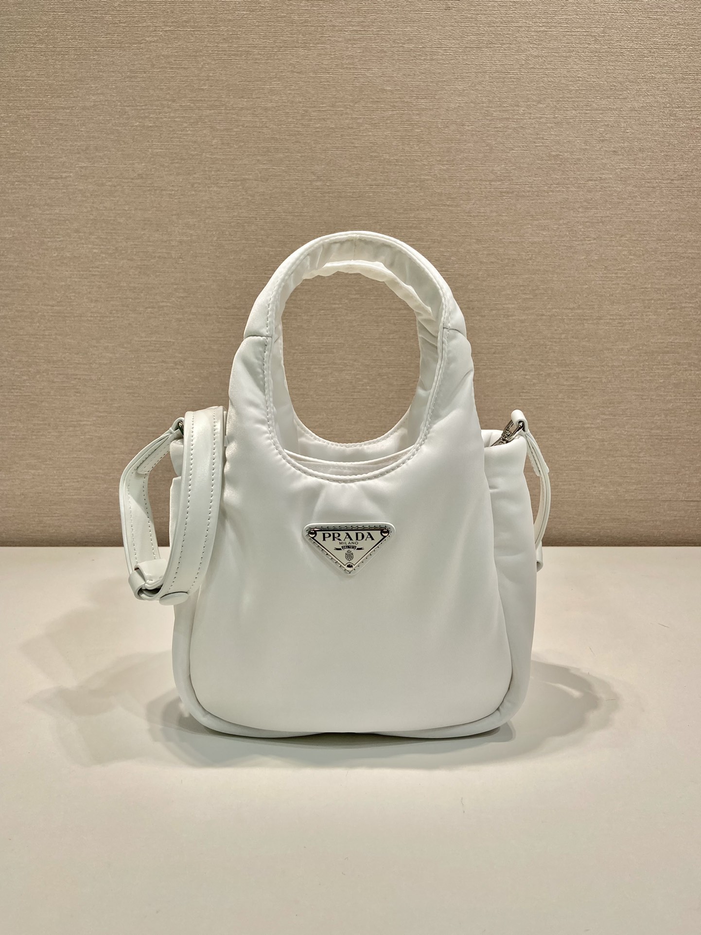 Pra*a soft padded re-nylon mini-bag