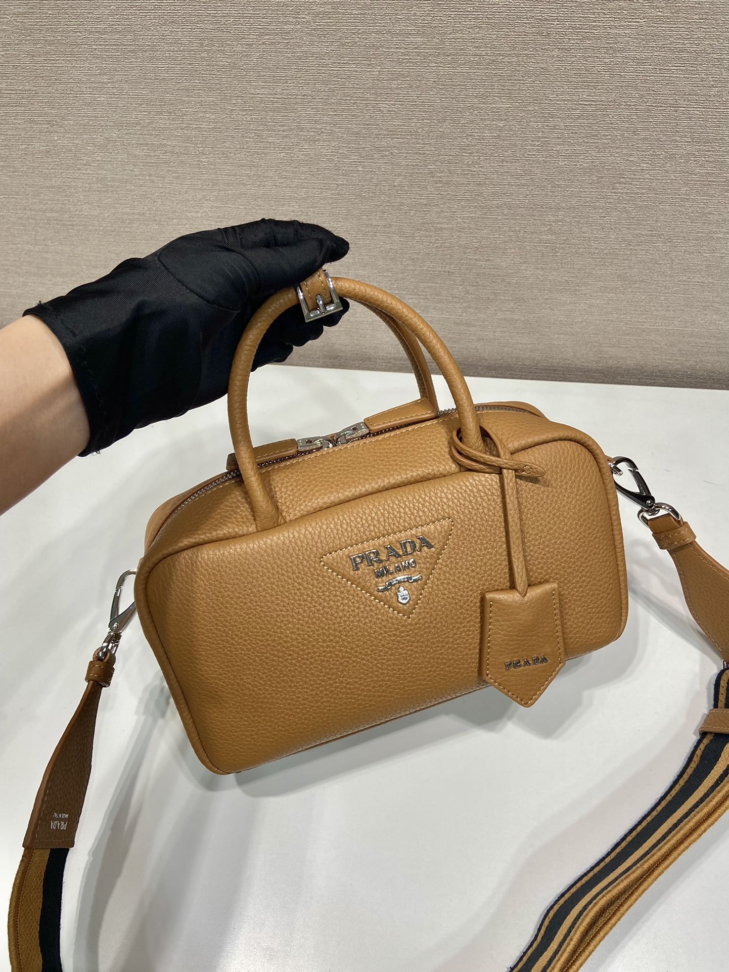 Pra*a leather top-handle bag