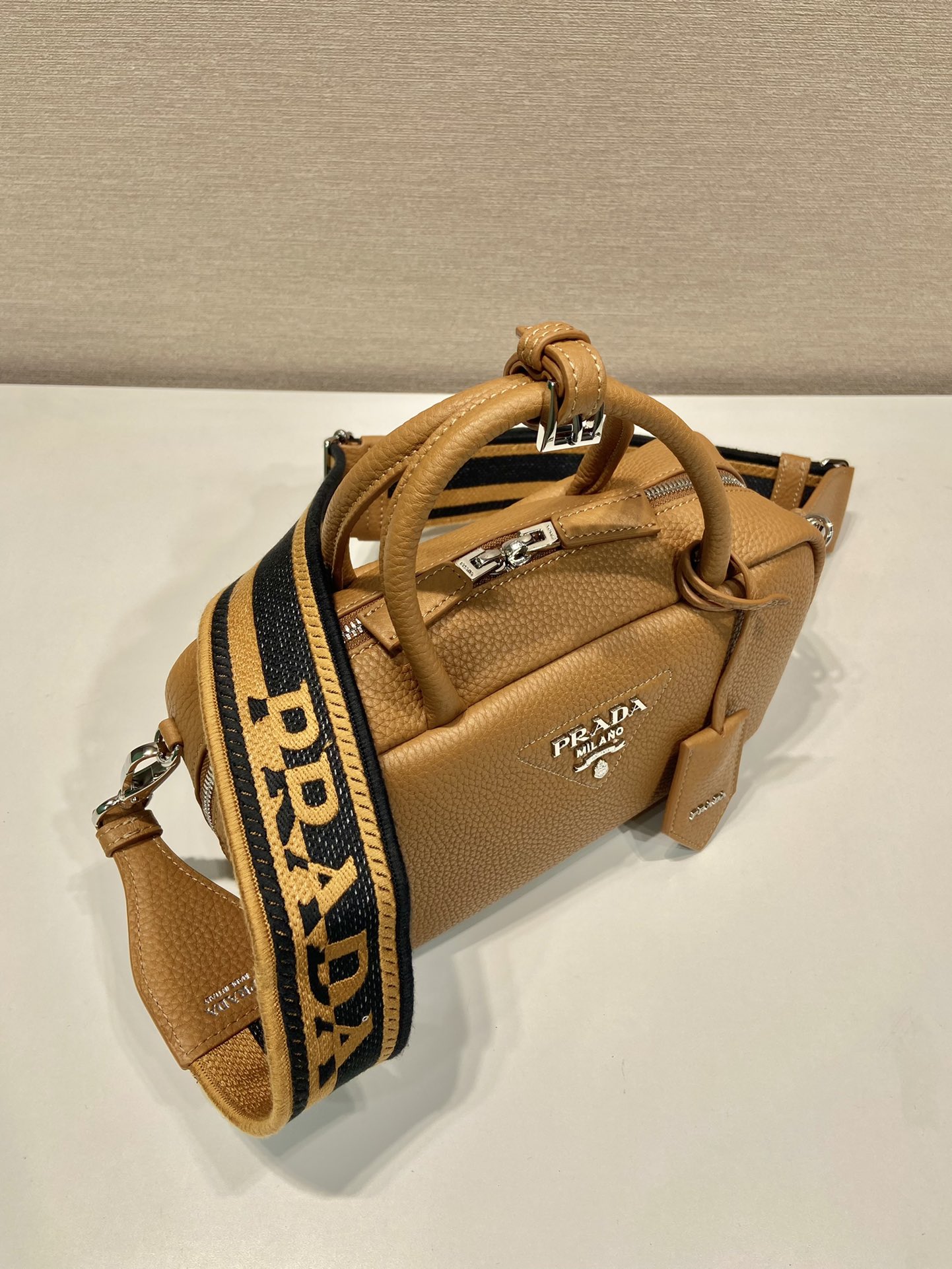 Pra*a leather top-handle bag