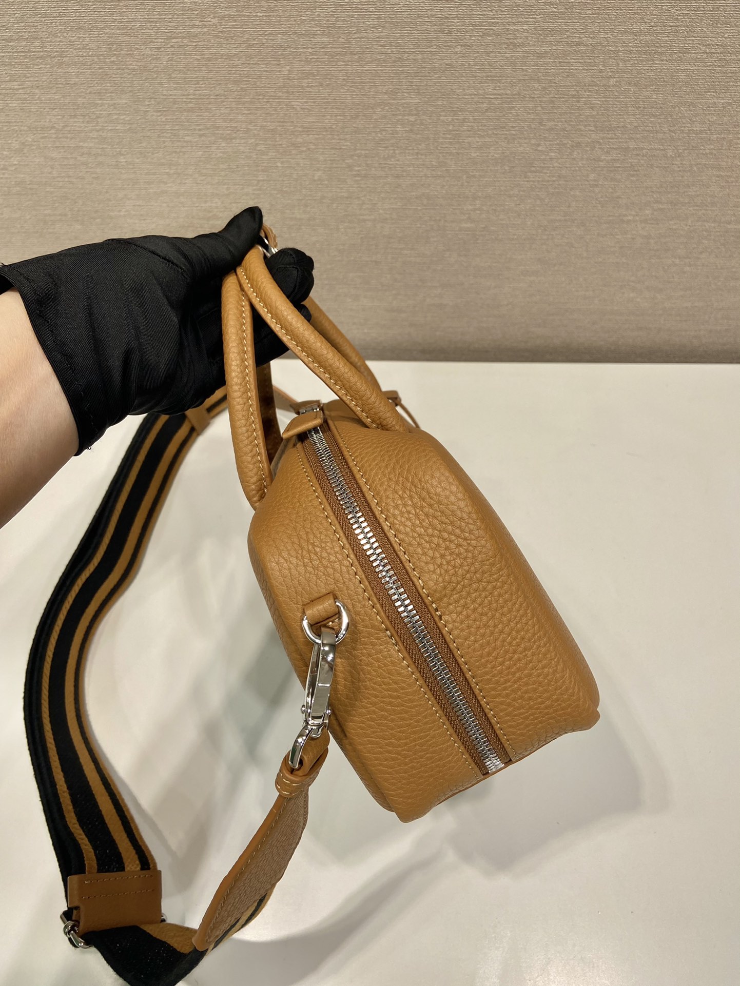 Pra*a leather top-handle bag