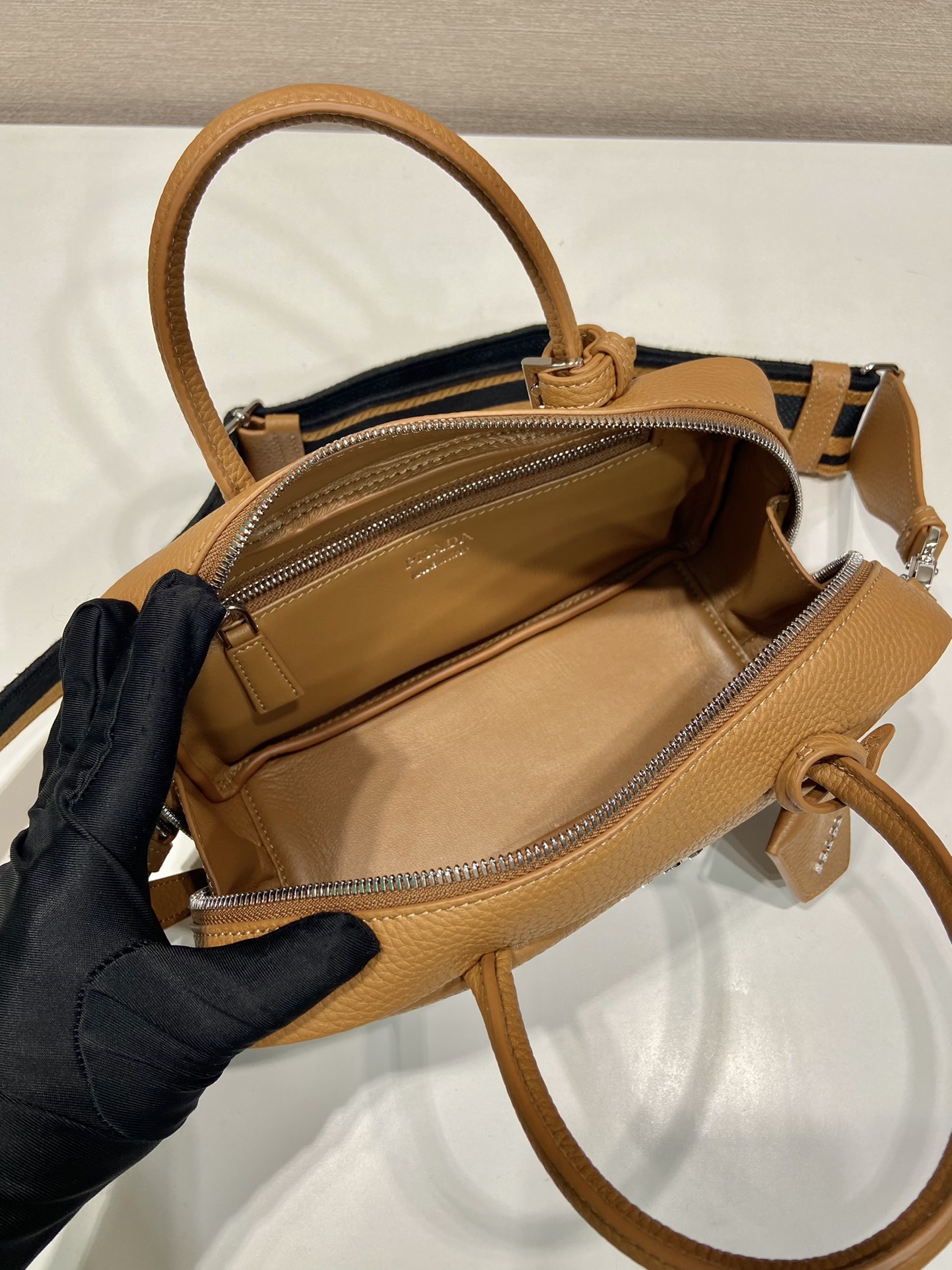 Pra*a leather top-handle bag