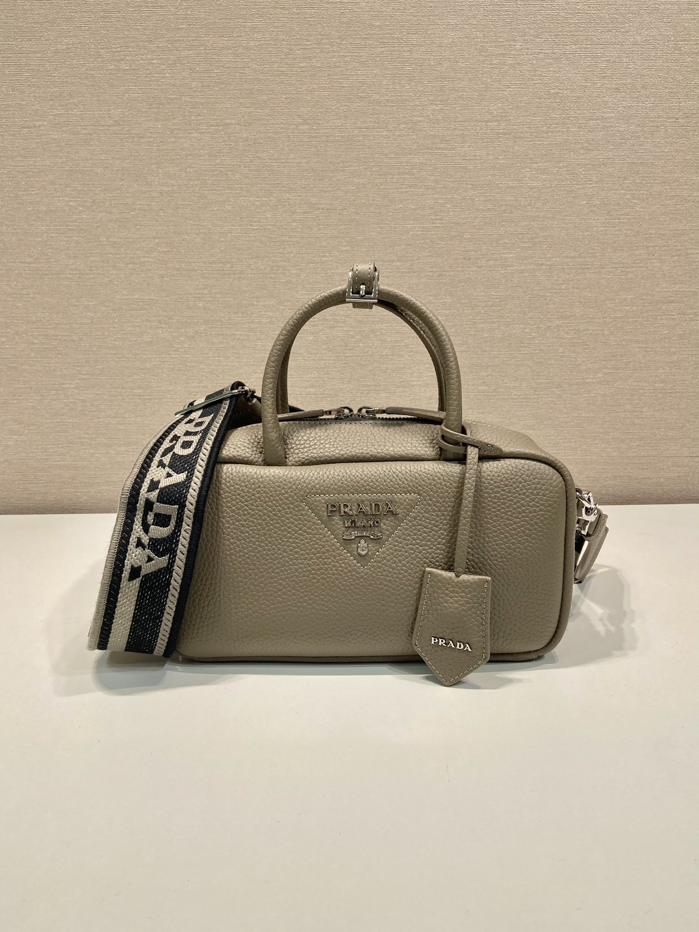 Pra*a leather top-handle bag