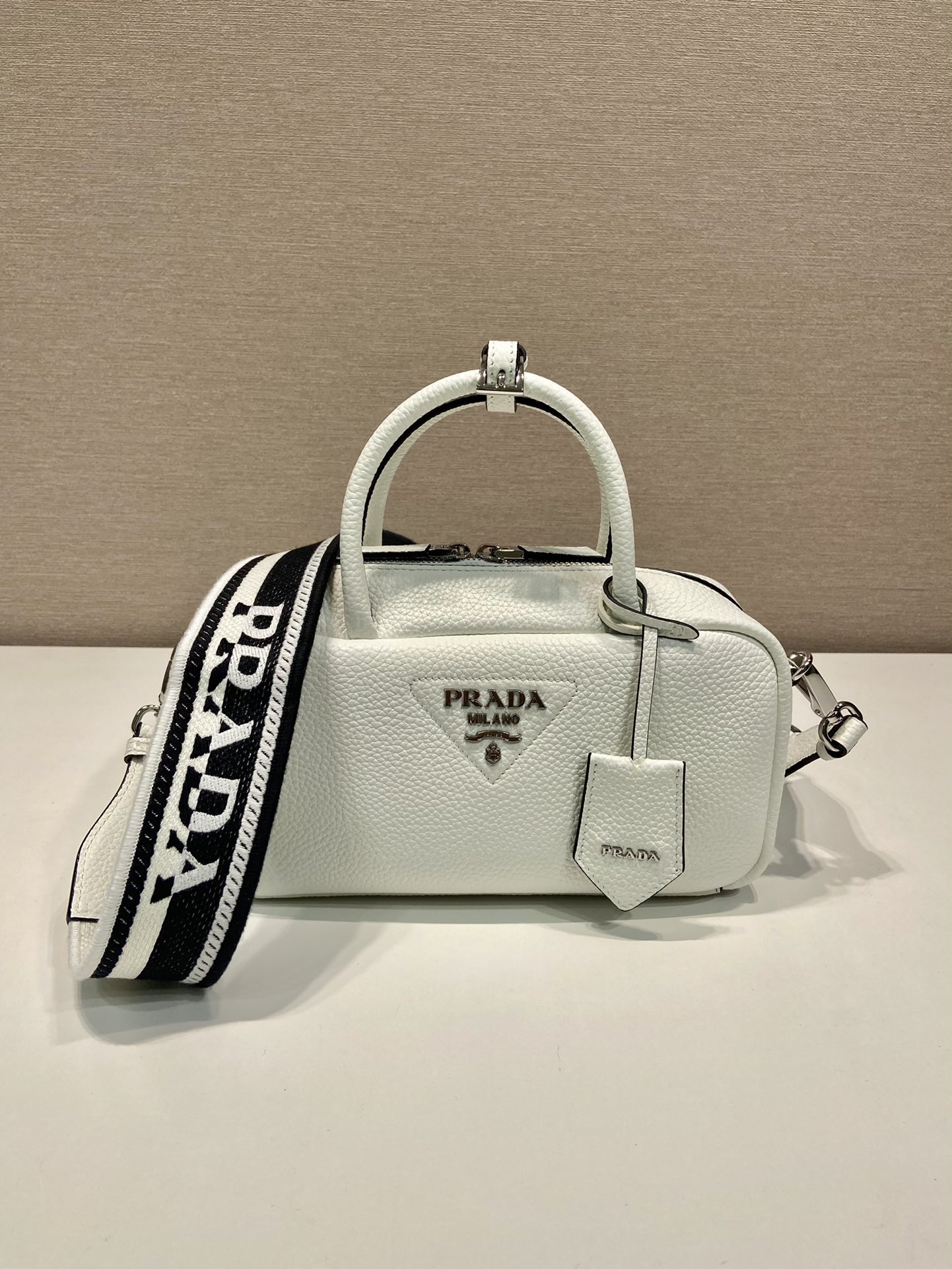 Pra*a leather top-handle bag