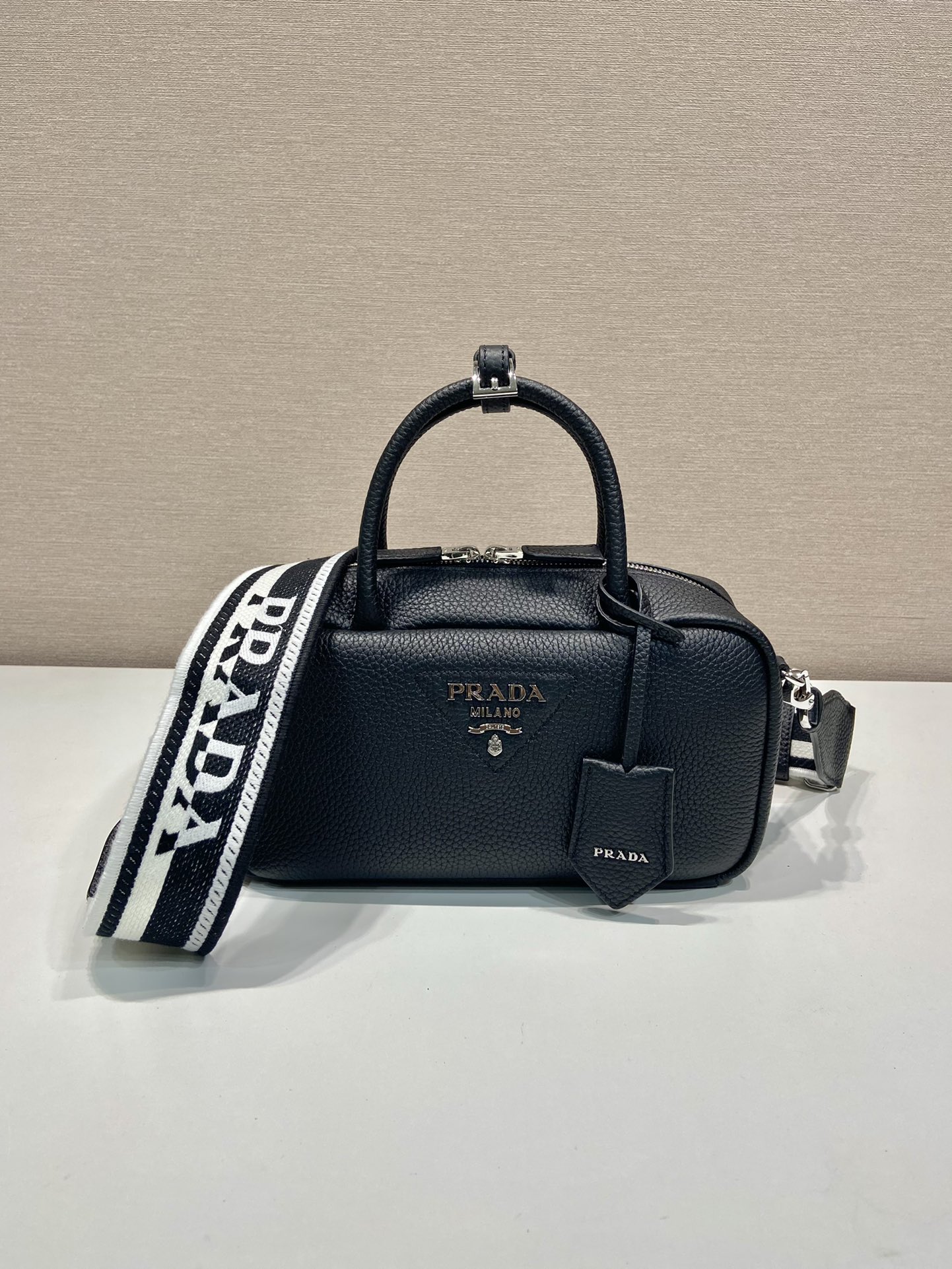 Pra*a leather top-handle bag