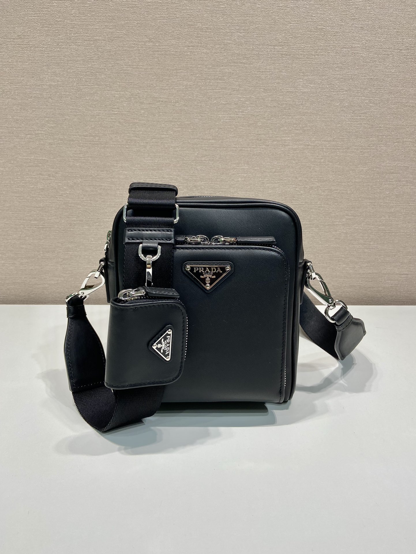 Pra*a leather shoulder bag with pouch