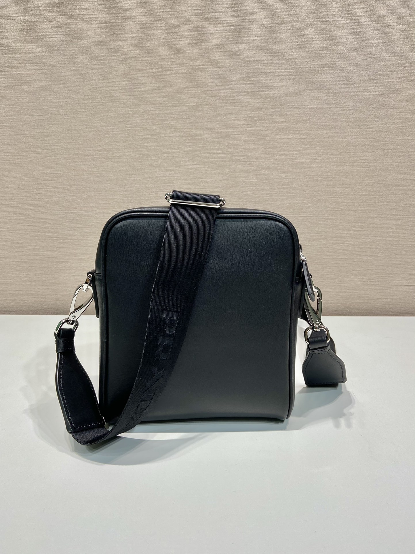 Pra*a leather shoulder bag with pouch