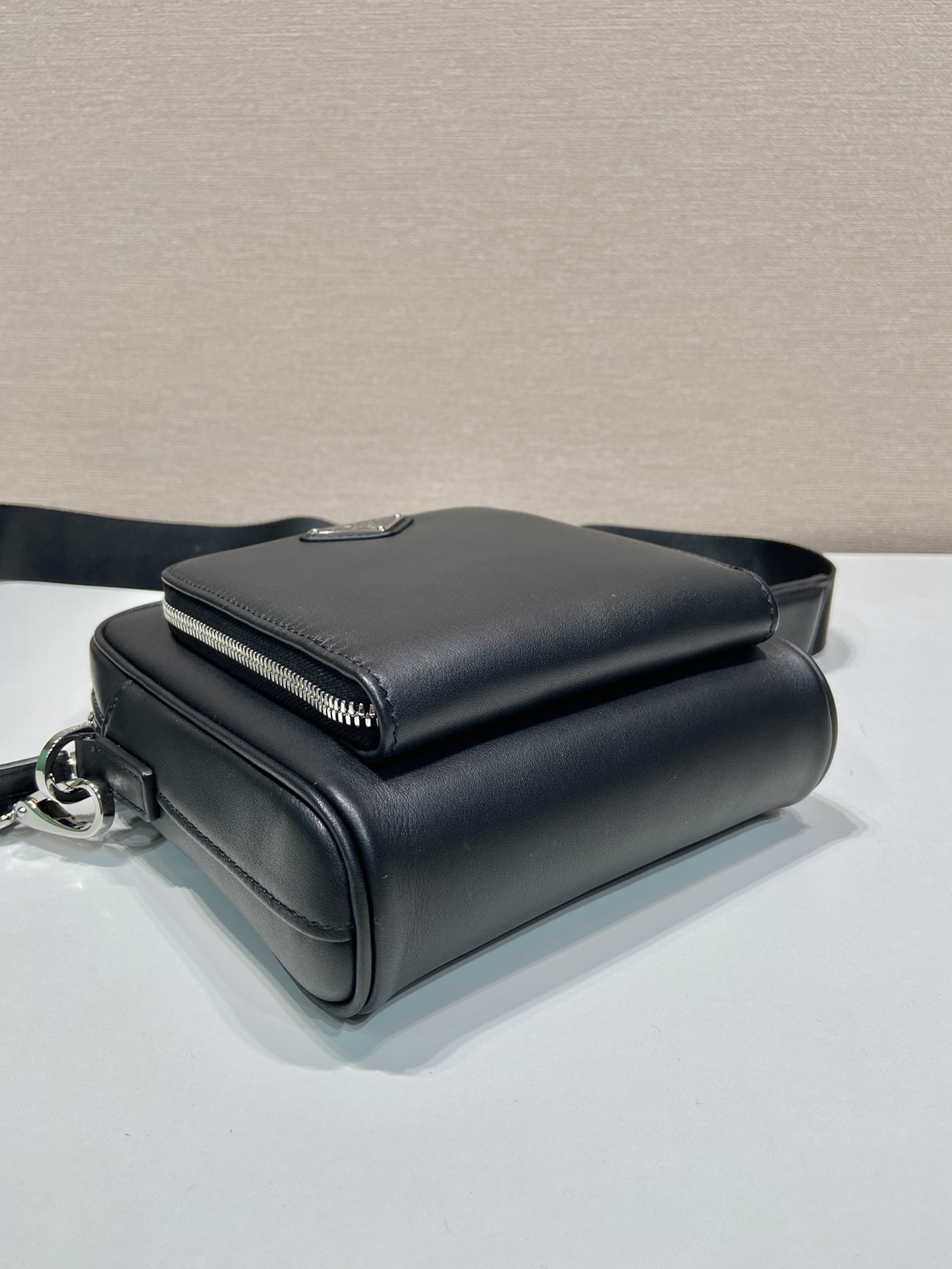 Pra*a leather shoulder bag with pouch