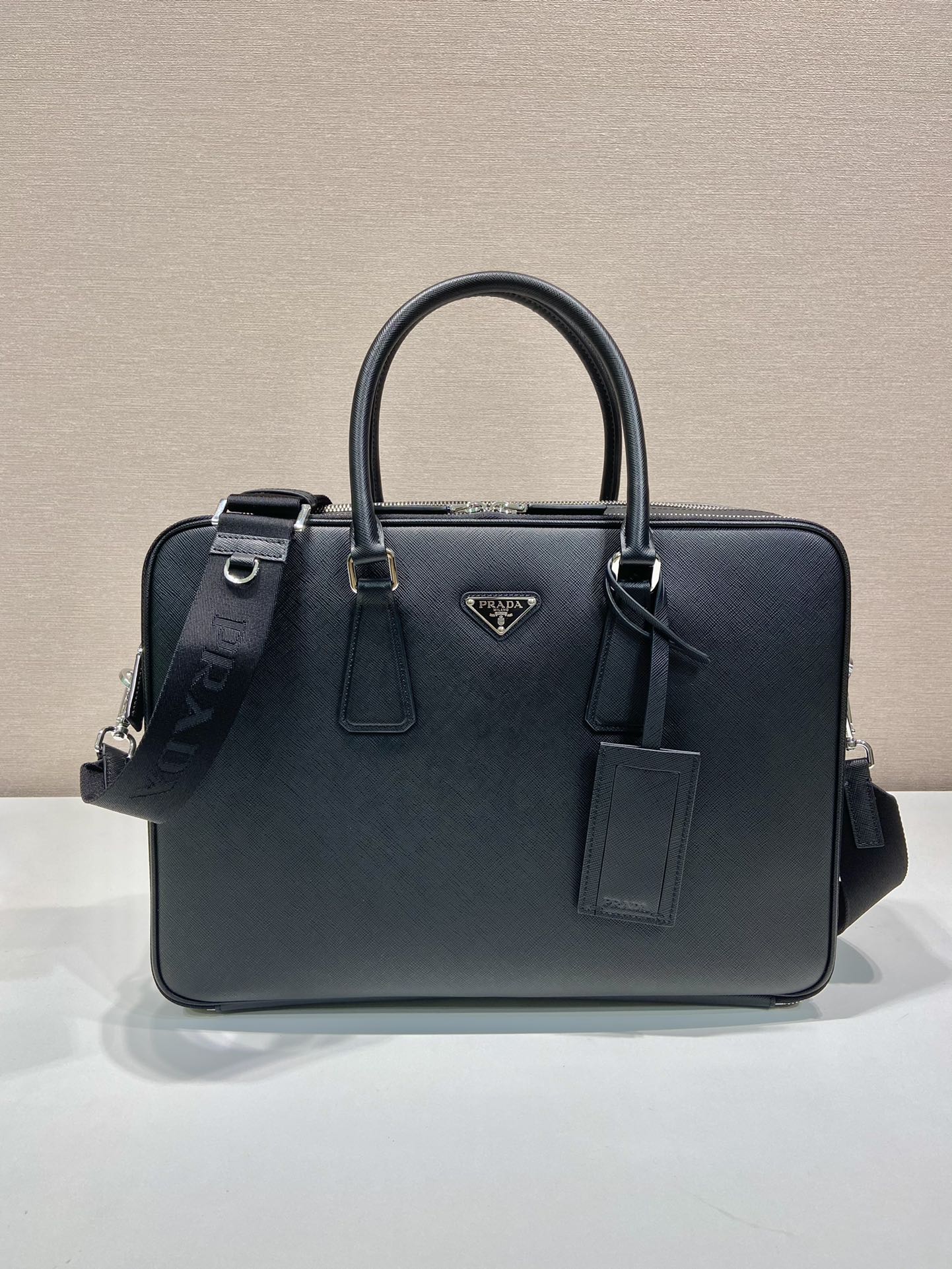 Pra*a saffiano leather briefcase