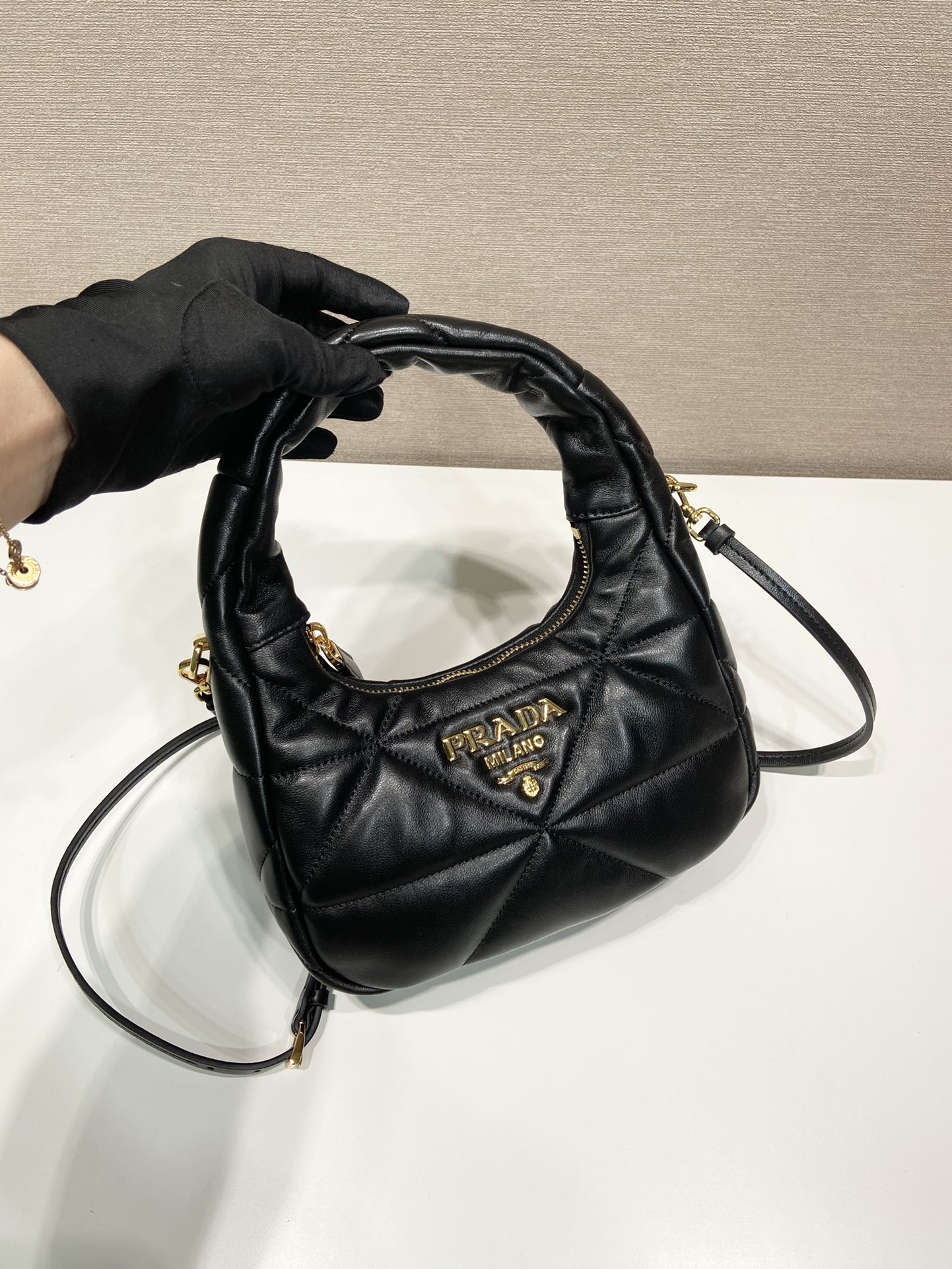 Pra*a nappa-leather mini bag with topstitching