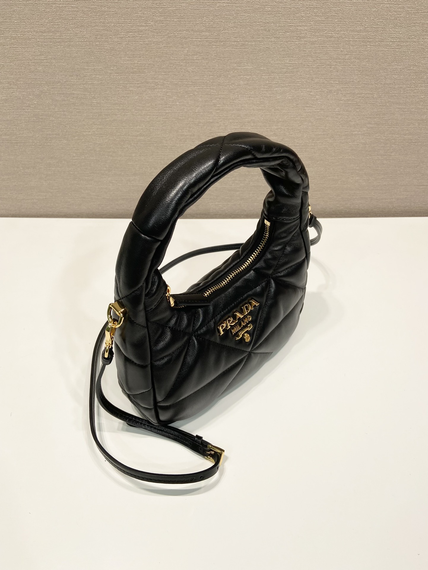 Pra*a nappa-leather mini bag with topstitching