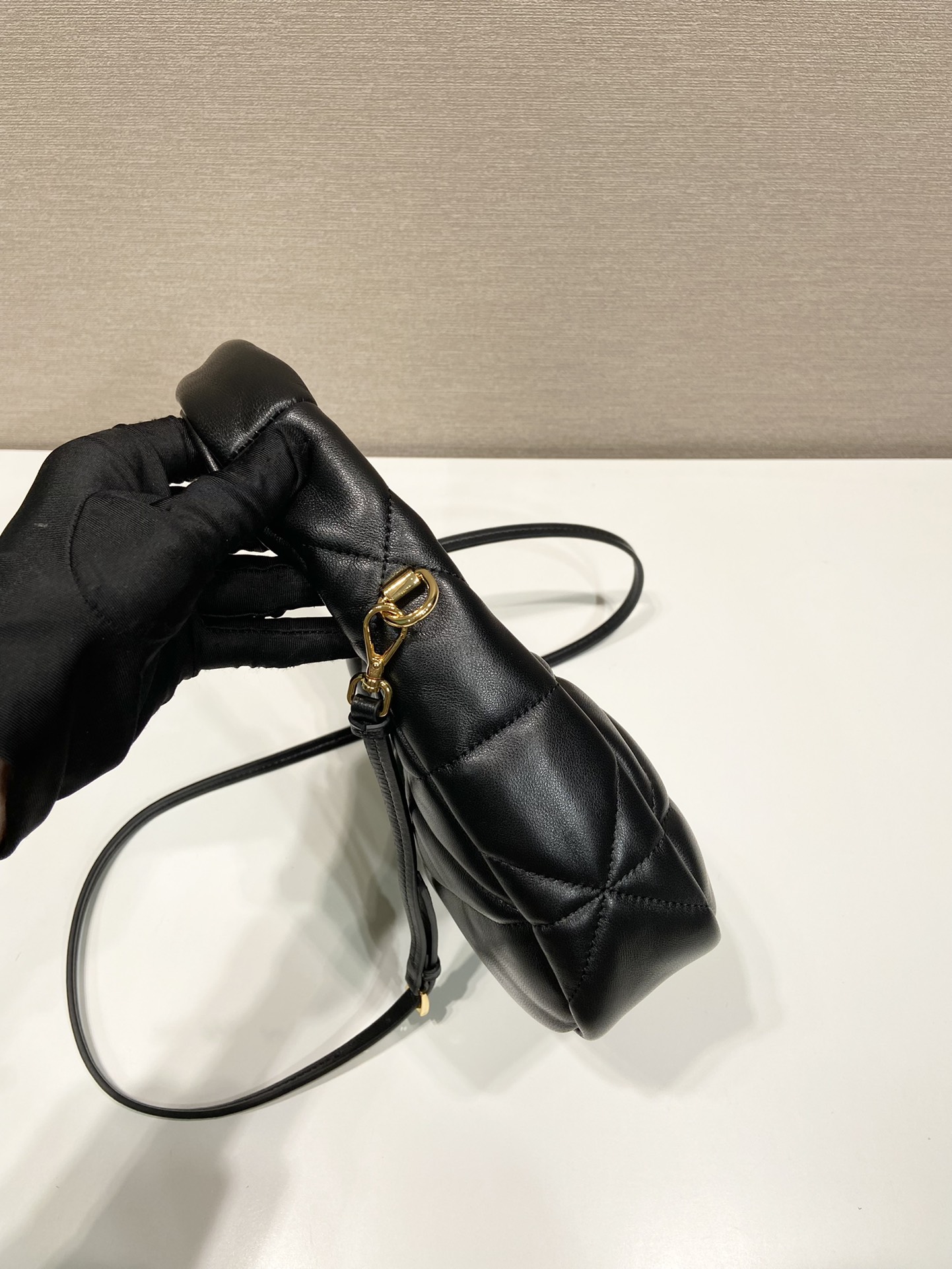 Pra*a nappa-leather mini bag with topstitching