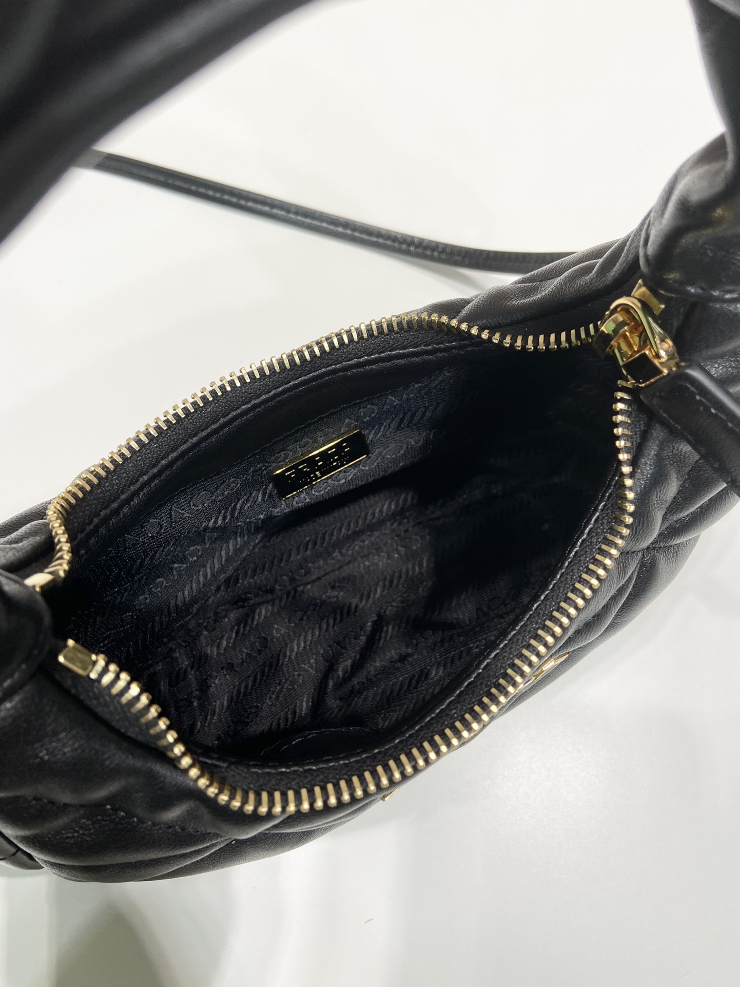 Pra*a nappa-leather mini bag with topstitching