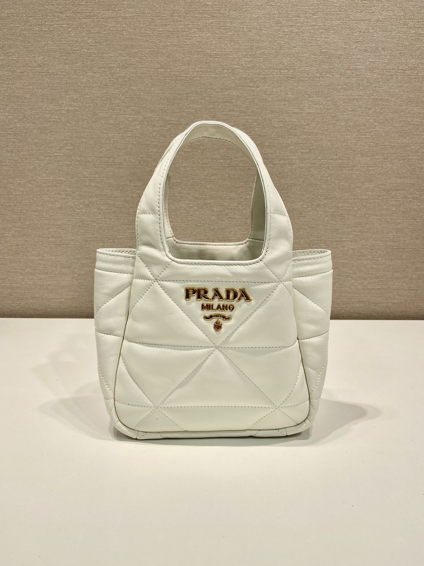 Pra*a small nappa-leather tote bag with topstitching